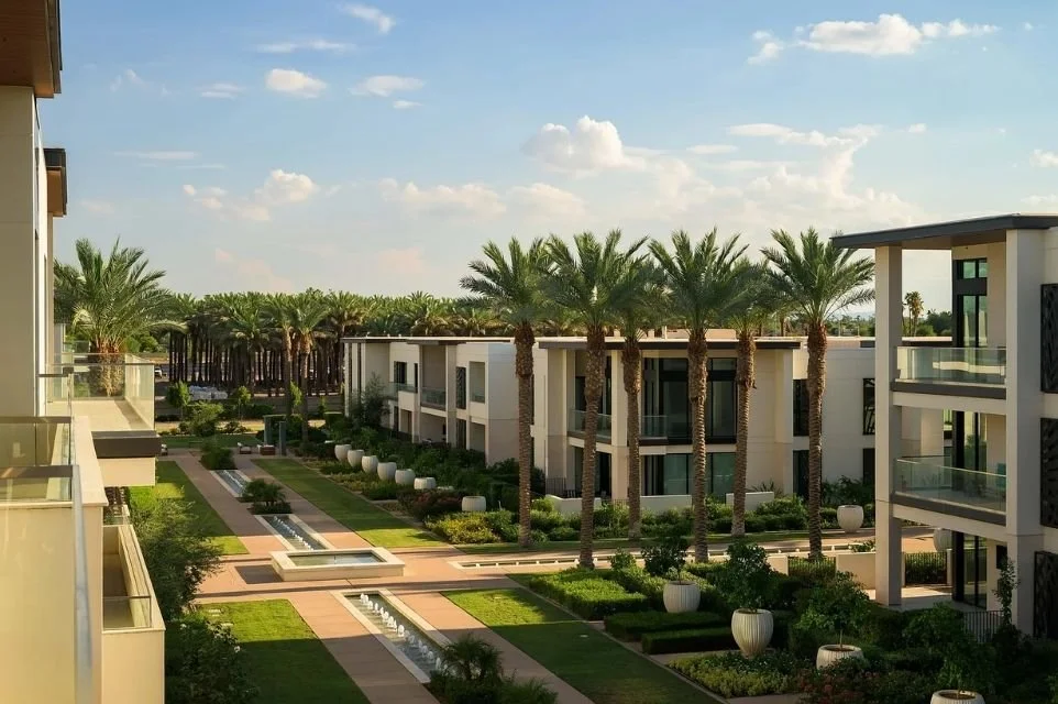 Modern luxury residential community with palm-lined courtyard architecture in Scottsdale, Arizona.