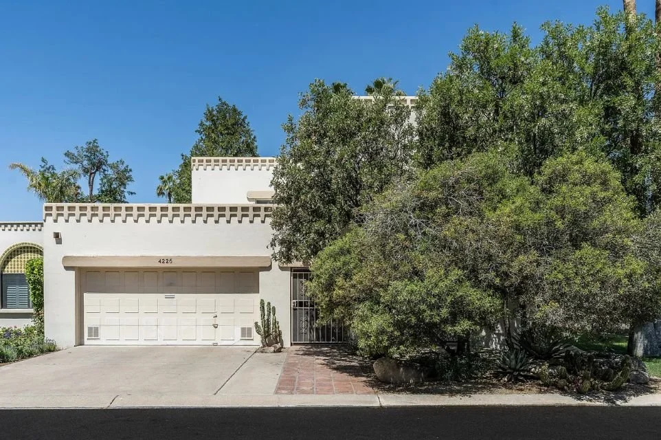 Villa d’Este Scottsdale luxury townhome community known for Mediterranean architecture, mature landscaping, and resort-style amenities.