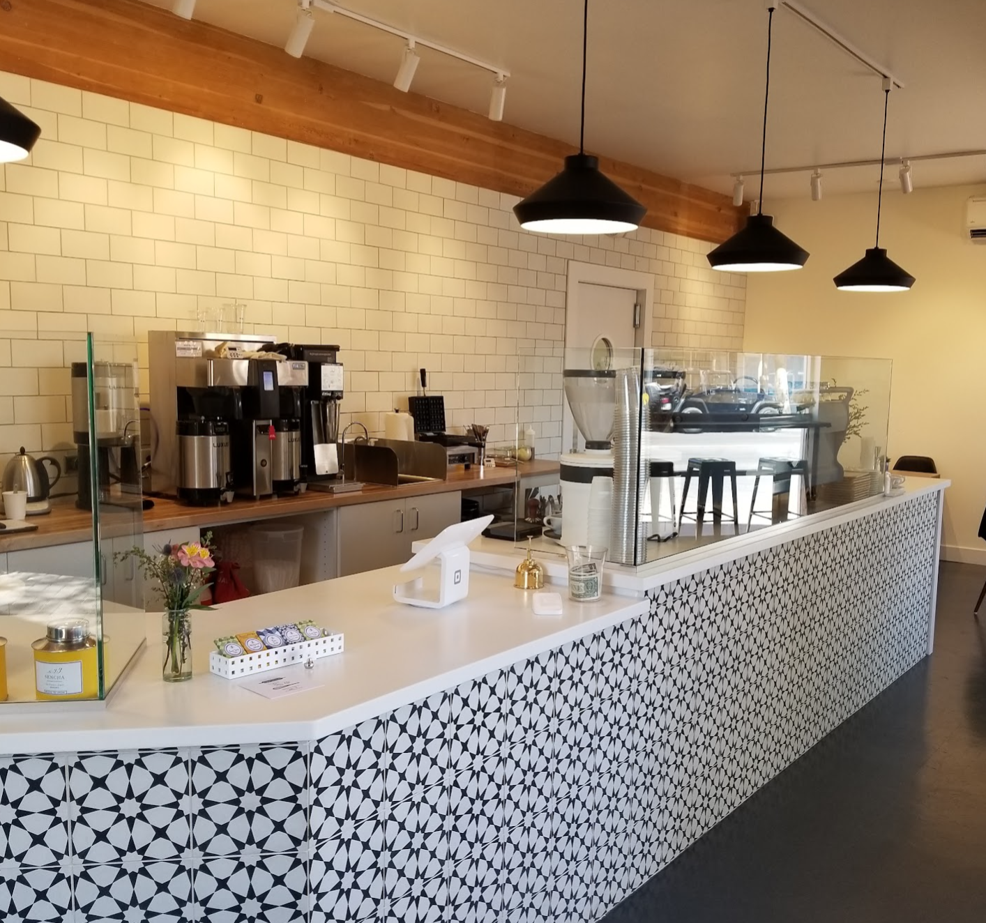 Interior of Berdena's coffee shop on Fifth Avenue in Old Town Scottsdale, featuring the periwinkle Synesso espresso machine