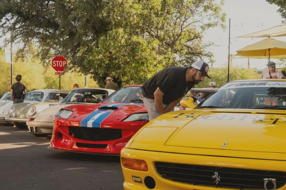 Exotic and classic sports cars lined up during a weekend car meet at FourTillFour Café in Scottsdale, Arizona.
