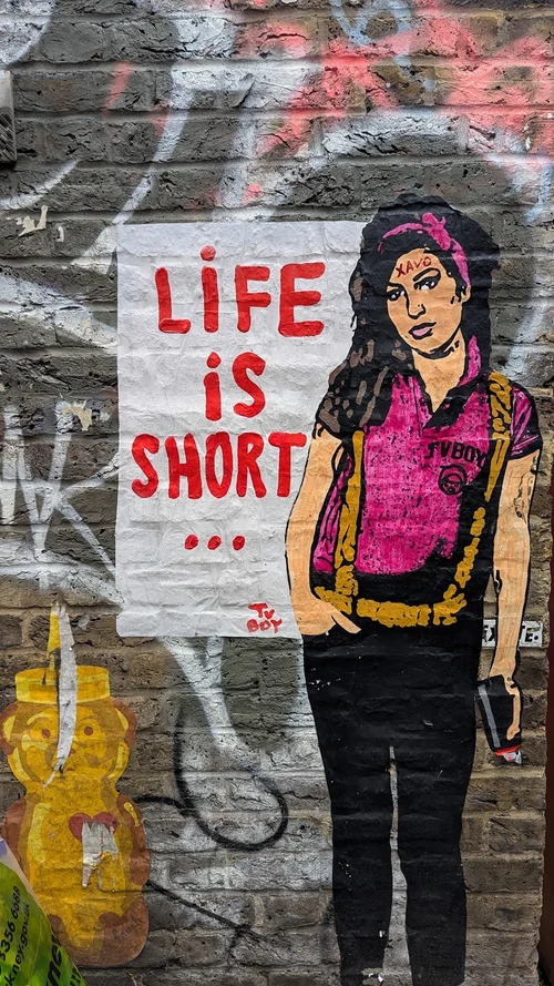 Street art at SXSW London: Life is short… Viva comedy.