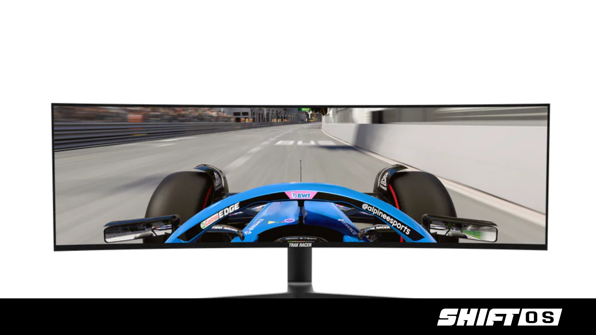 Simulated view from an open-wheel Formula racing car on a racing circuit, showing the front wing, steering wheel, and part of the cockpit, with blurred surroundings indicating high speed.