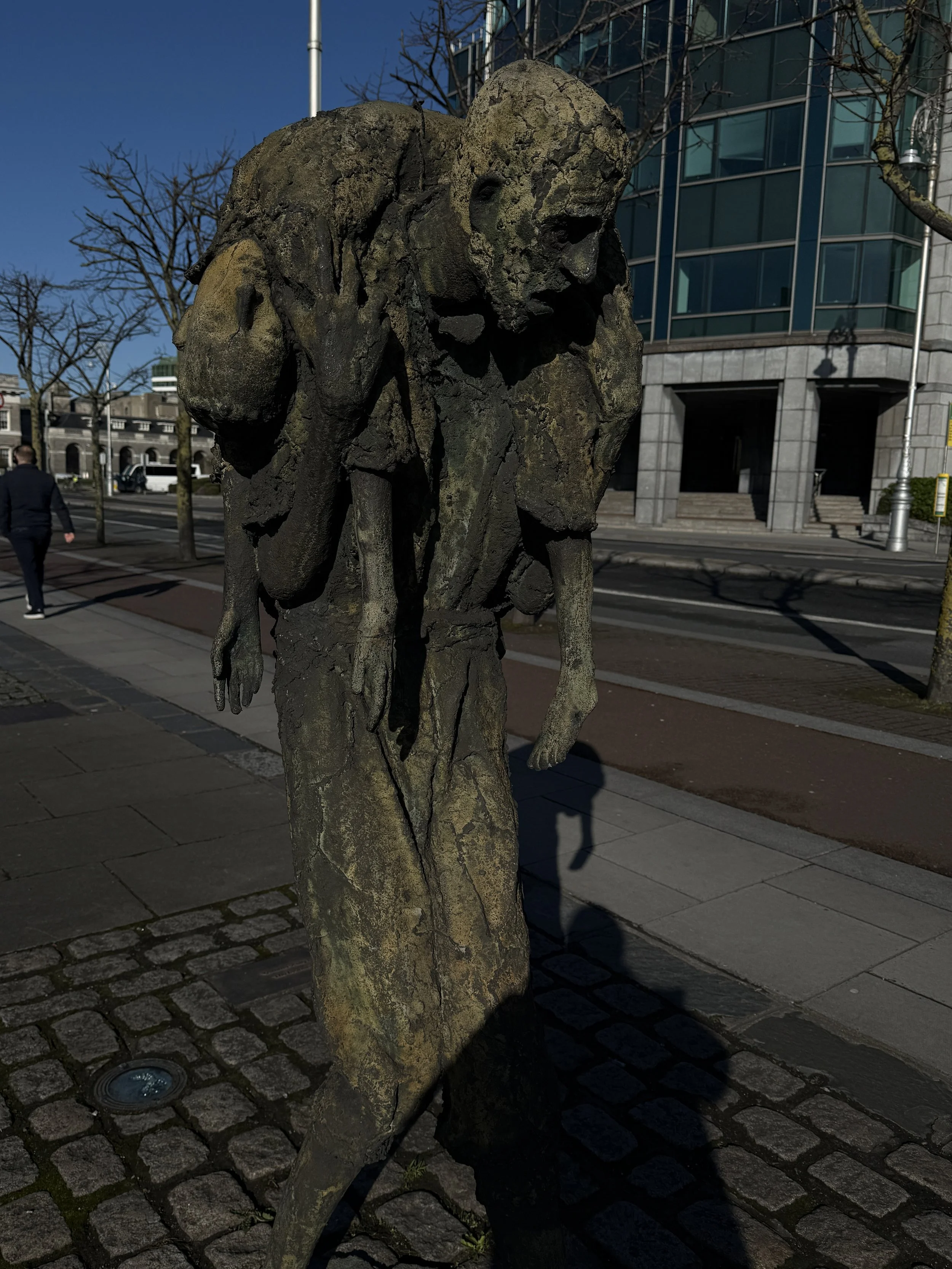 Statue of the famine memorial, a person