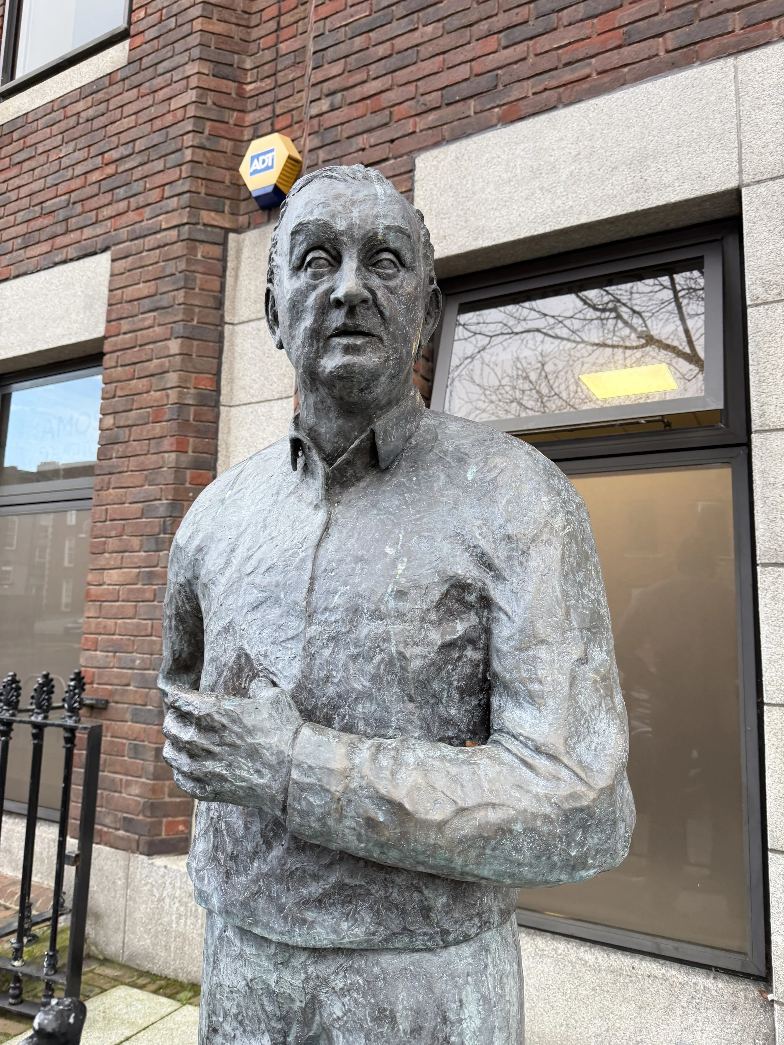 Close up of John B Keane statue