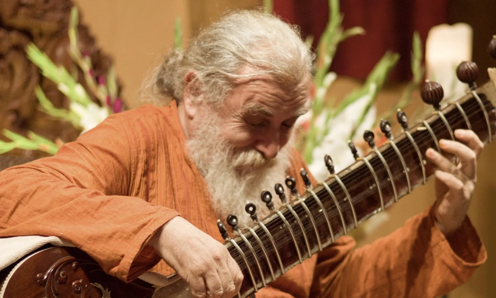 Dr Mark Dyczkowski playing sitar.