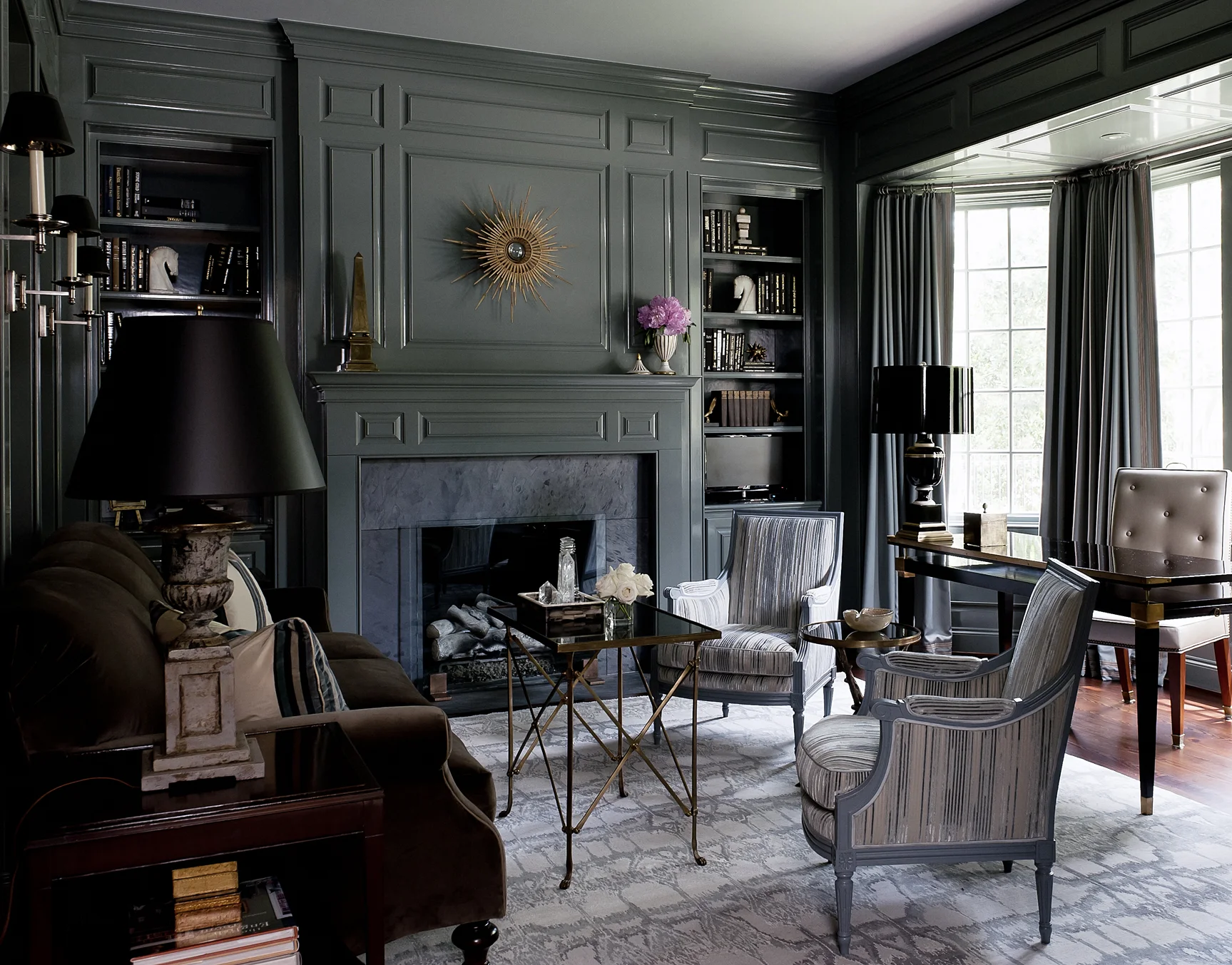 This photo just does not do the space justice. This study is a perfect balance of feminine and masculine, and the sage paneled walls are both sophisticated and cozy.