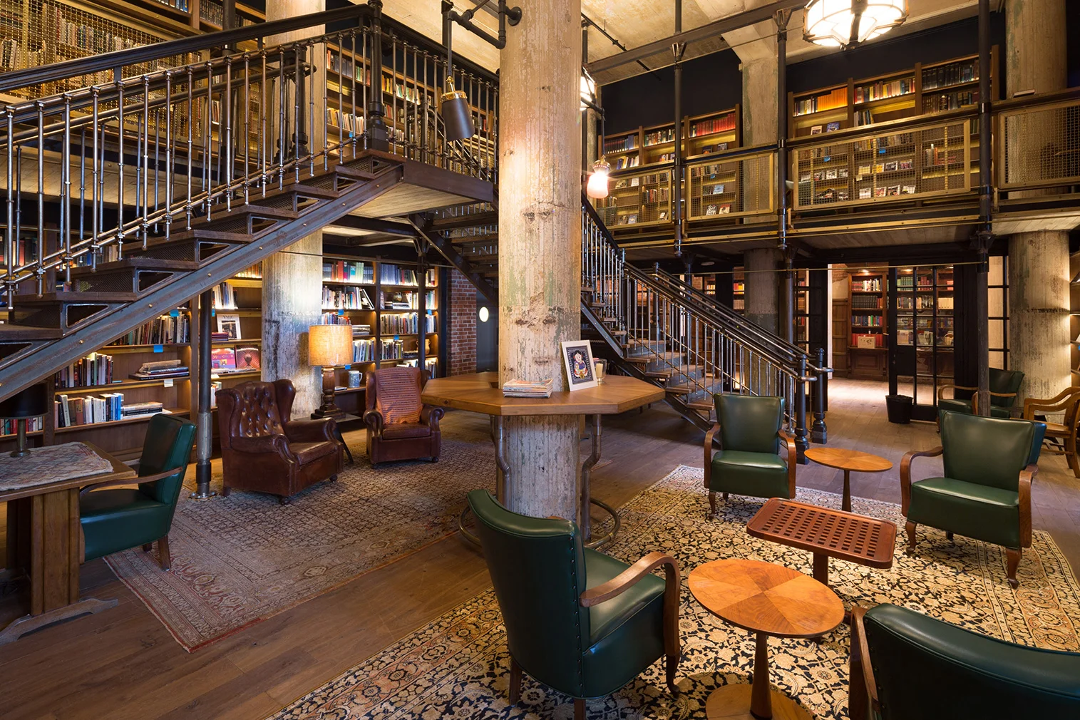 The library, where guests are greeted with a complimentary margarita. [Photo Source: The Spaces]