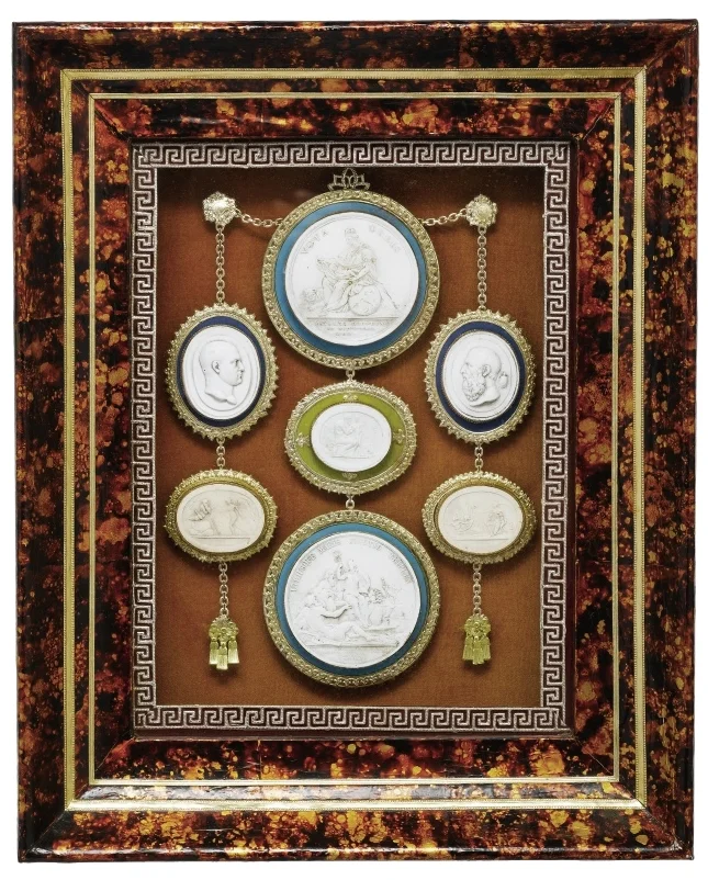 Ornately framed intaglios from the 19th century sold on Sotheby’s.