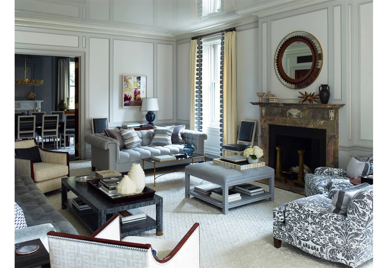 Please note the interesting furniture layout and the use of different types of coffee tables — metal and glass, upholstered, and black cerused wood — THIS is a prime example of why I turn to Gambrel time and again for inspiration.