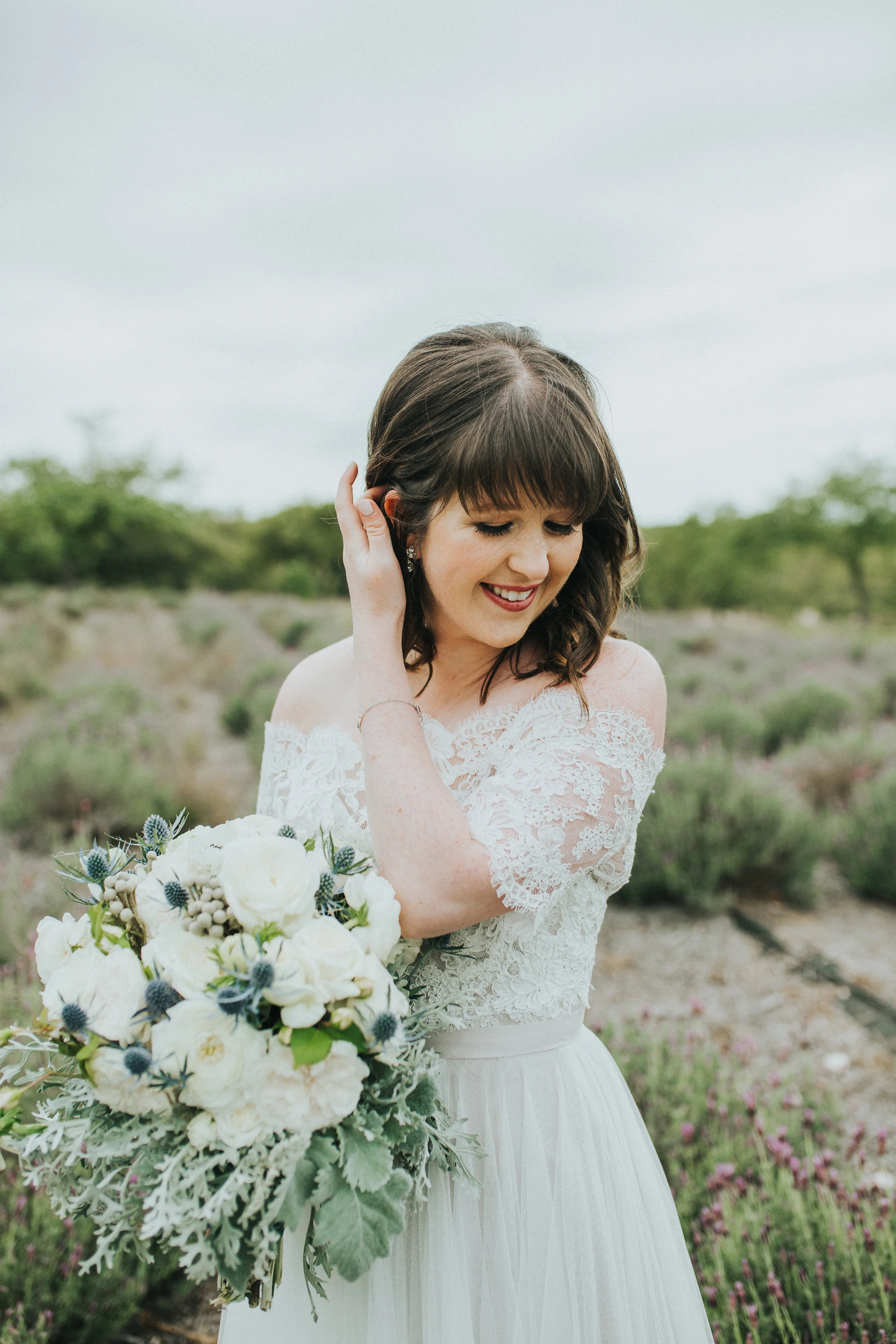 I wanted my dress to be simple and romantic. I fell in love with the subtle mocha undertones in the skirt and ribbon belt, and paired it with a delicate lace off the shoulder jacket.&nbsp;