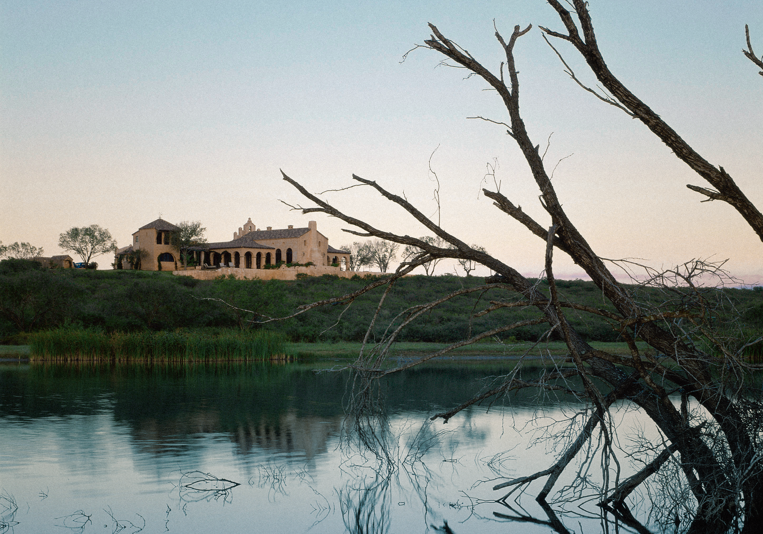Rancho Dos Vidas: "The compound draws its forms, geometry, and details from the Spanish colonial archetypes of south Texas and northern Mexico: missions, haciendas, presidios, and public places familiar to the outposts of the frontier."