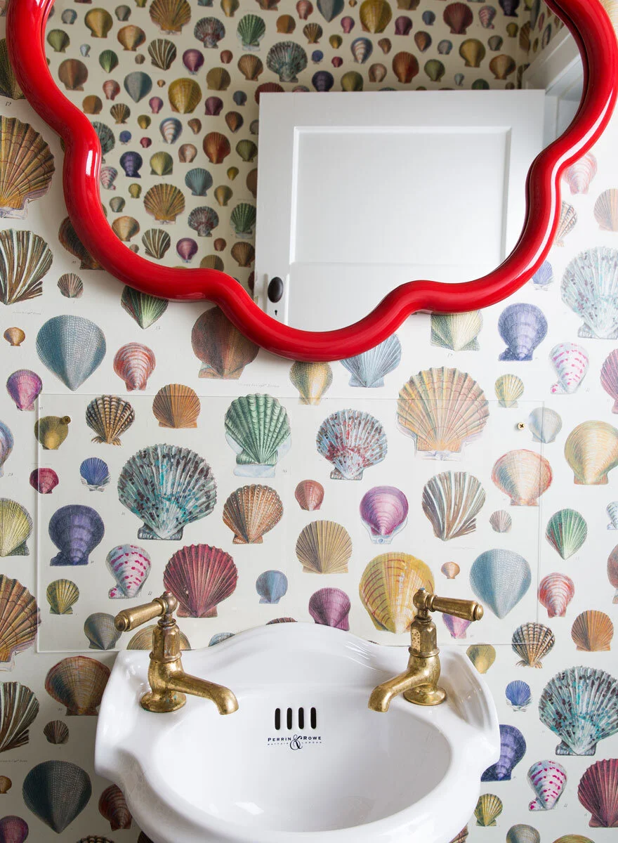 Spiro’s office: playful powder room featuring Balineum’s Flora Wall Mirror.