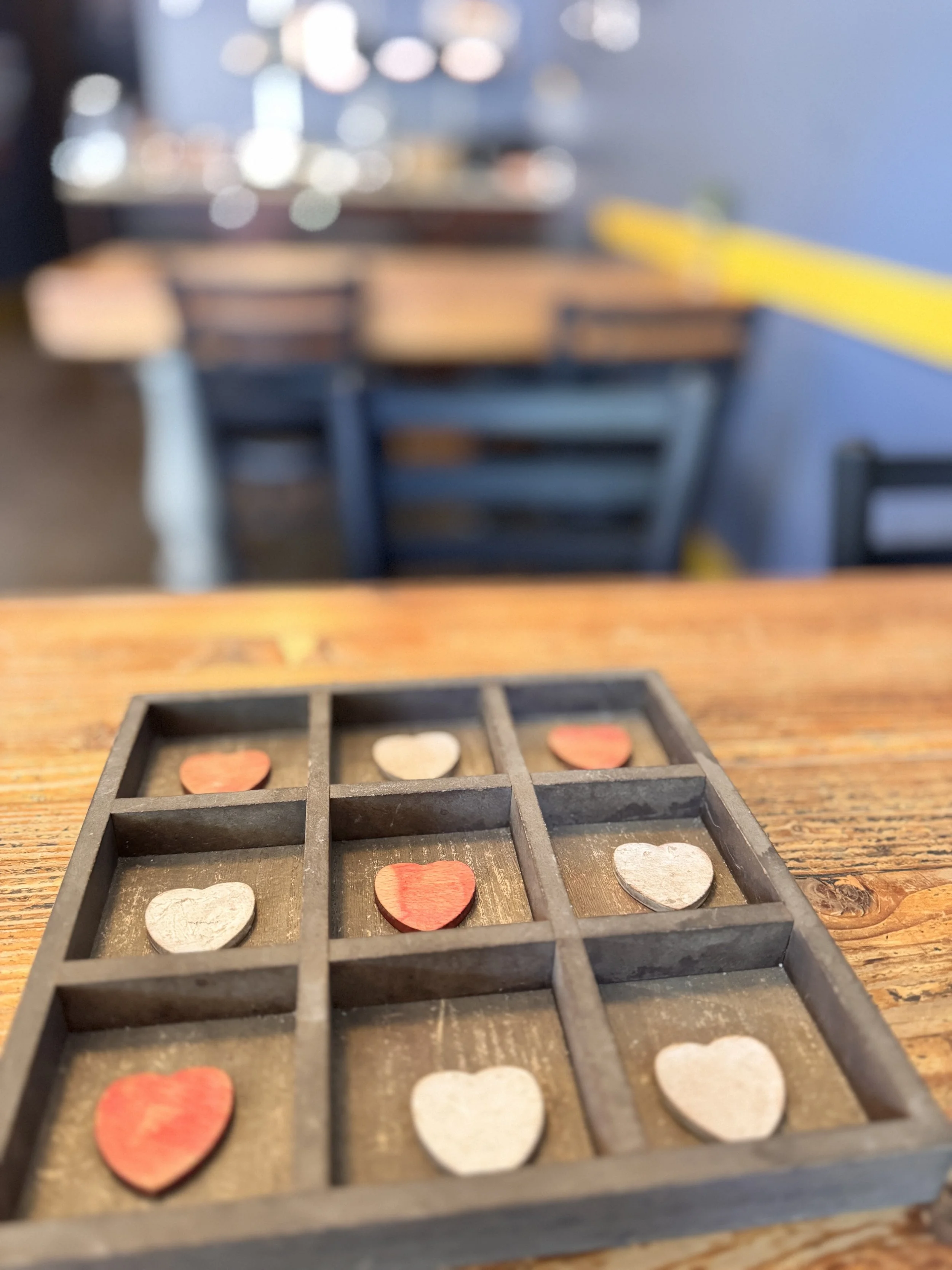 a game with heart shaped pieces