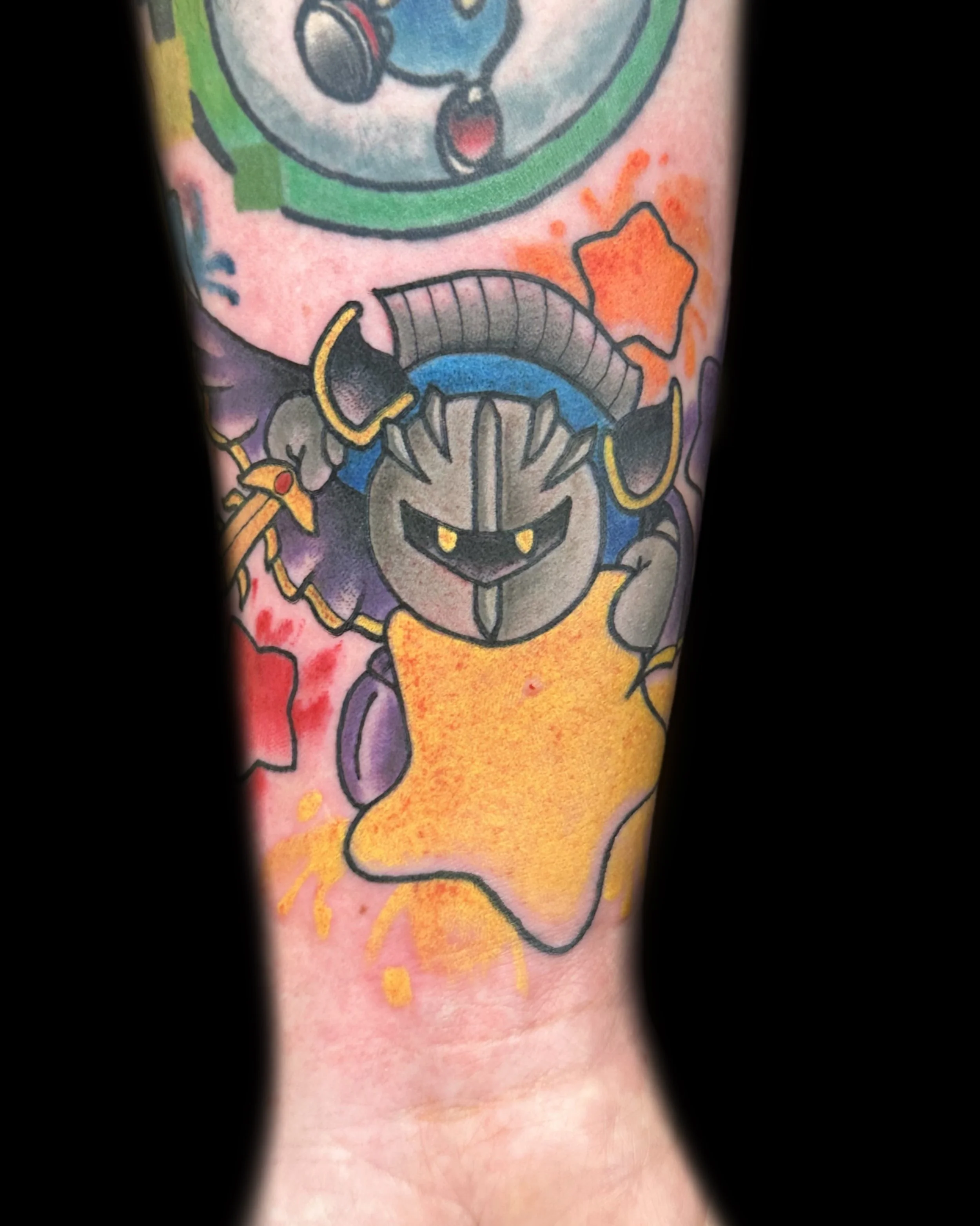 A colorful tattoo featuring a knight with a helmet, dark armor, and yellow eyes, holding a sword, surrounded by abstract shapes and splashes of color.