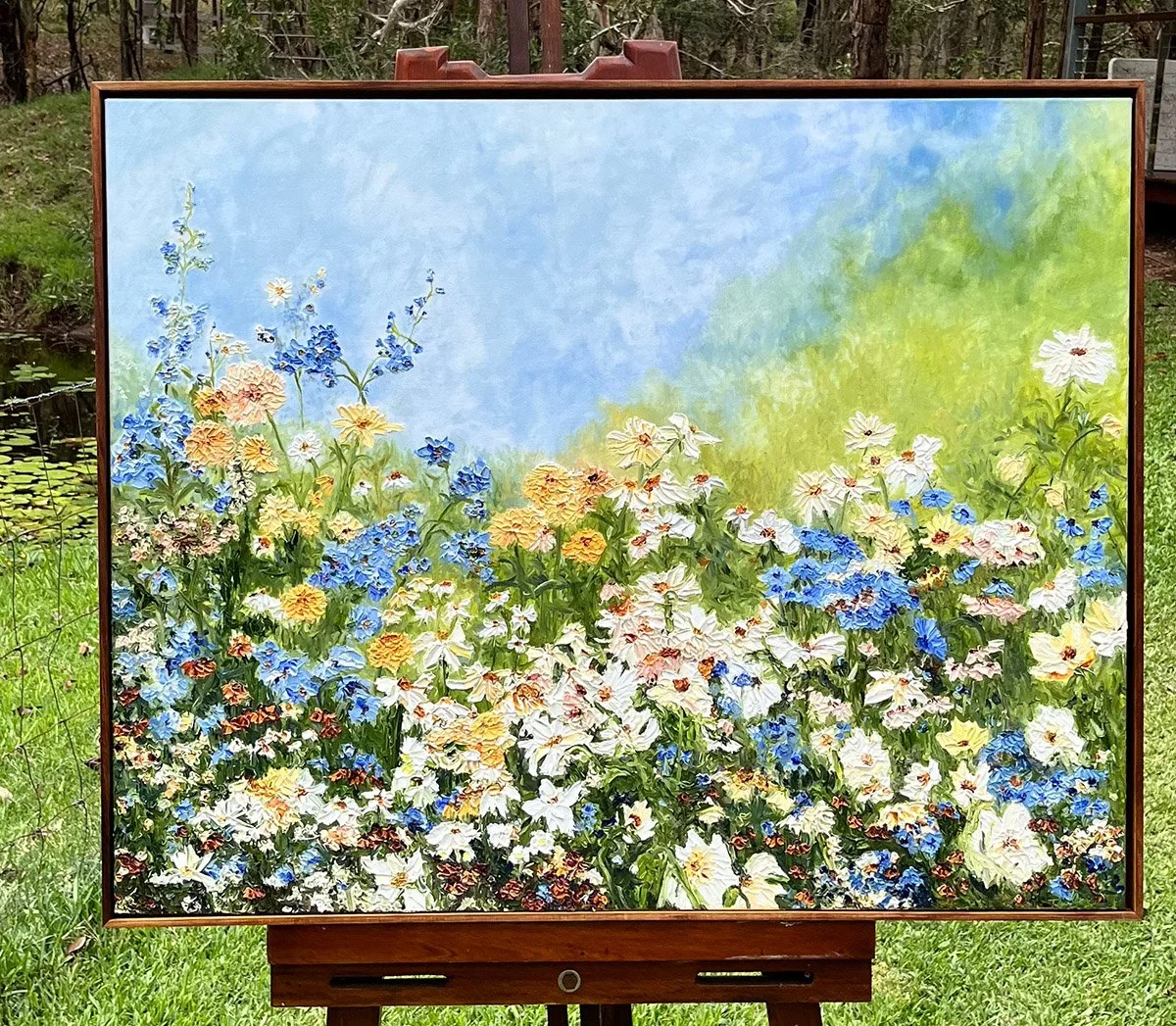 SOLD - 'Weaving a Vertical Line of Sweetness', 103 cm x 83 cm, oil, in Blackwood frame.
Sensational delphiniums dancing up into the sky next to proud cosmos and daisies. Emerald green grass cradles crimson flowers, while blue nigellas weave in to the