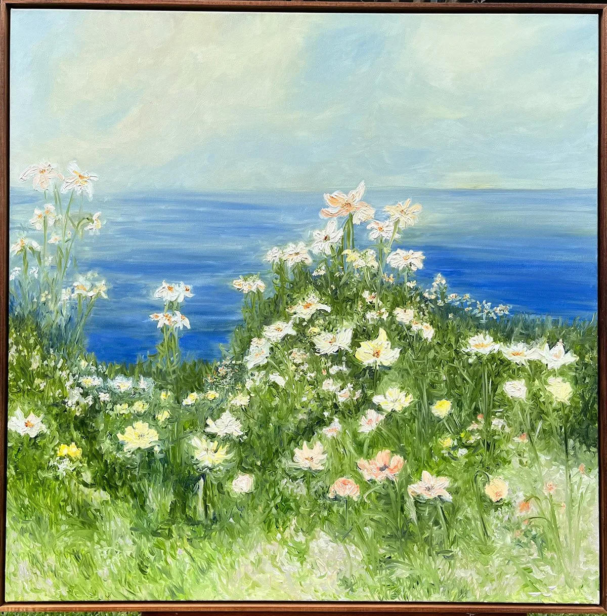 SOLD - 'Sea of Beauty', 95cm x95cm, oil, blackwood frame.
Sea and sky meet on this beautiful textured oil painting that emits tranquility and delight. Cosmos, dahlias, California poppies, scabies, daisies fill the hillside.