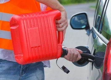 driver-fills-fuel-empty-car-260nw-1988322782.jpg.png