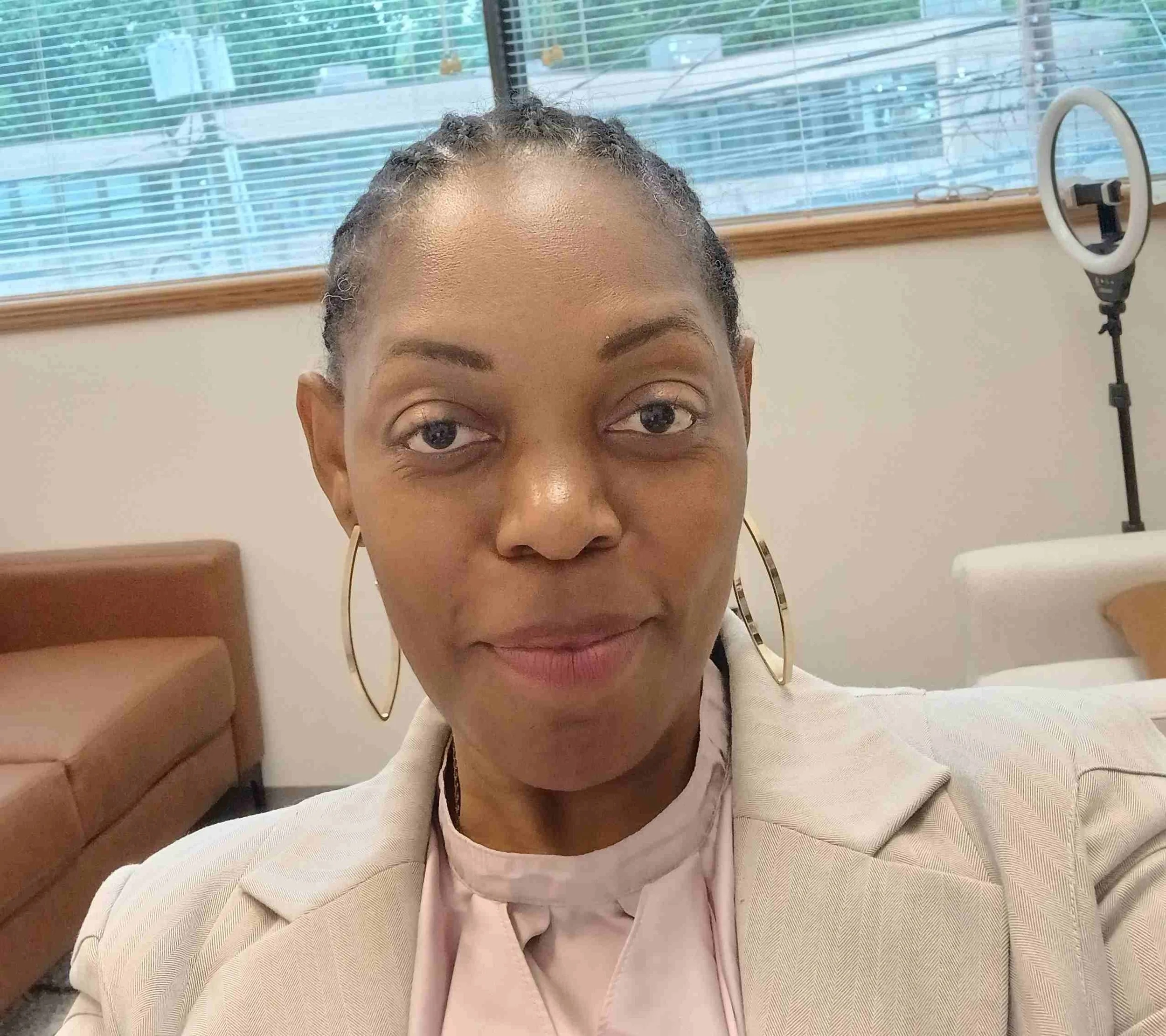 A woman with braided hair who is a therapist in Millburn NJ