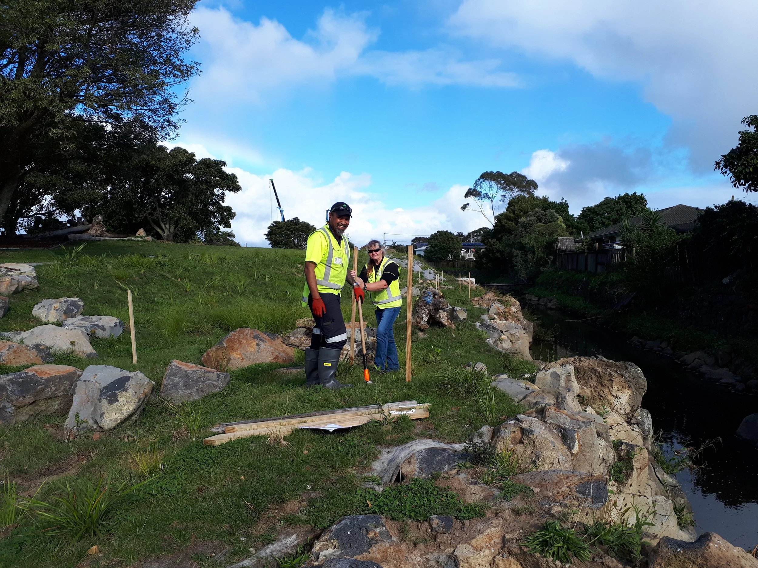 Te Whāngai Trust team members planting riparian margins. Image attribution: Mark Lewis, Boffa Miskell. 