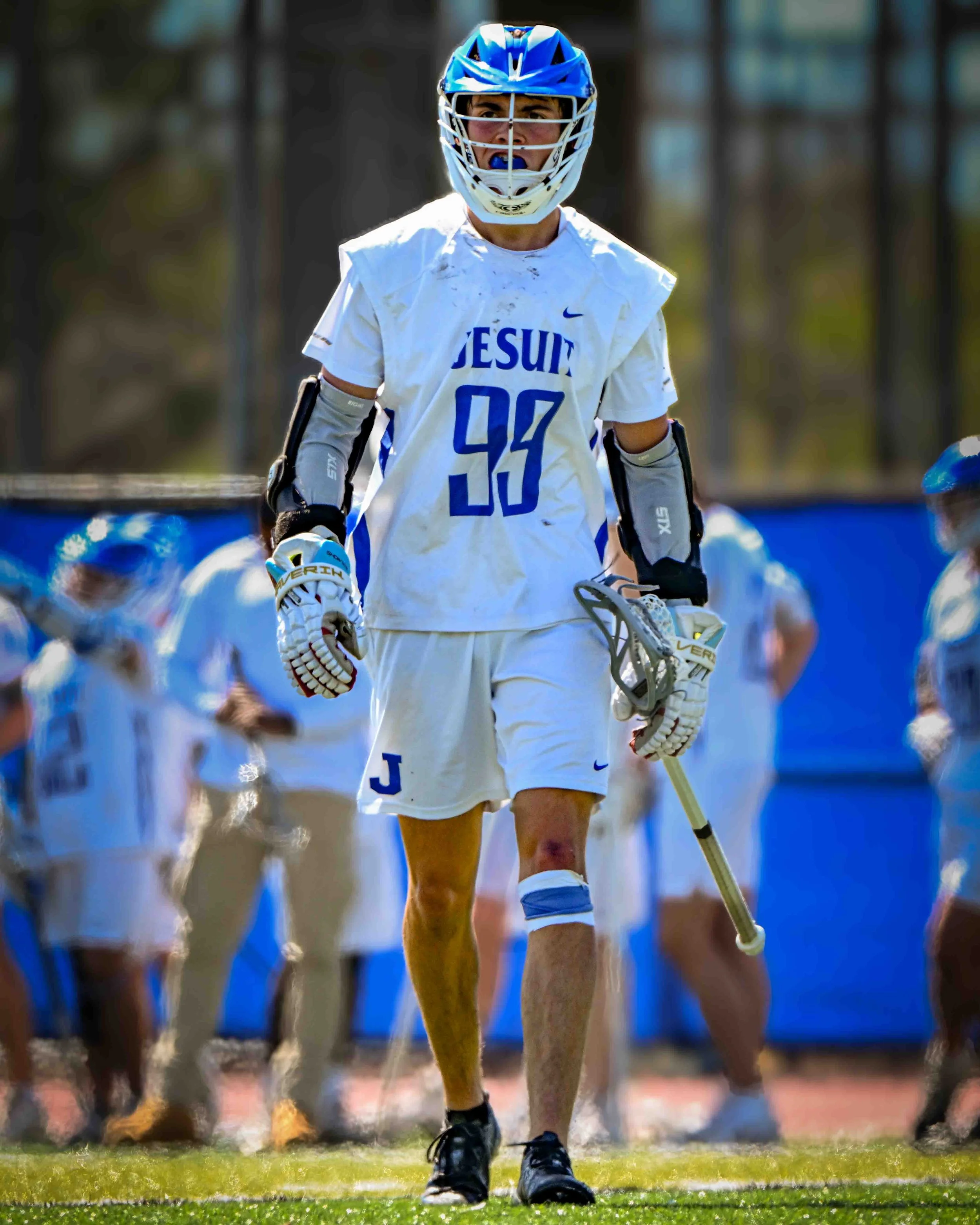 Lacrosse-Player-Walks-Onto-Field.jpg