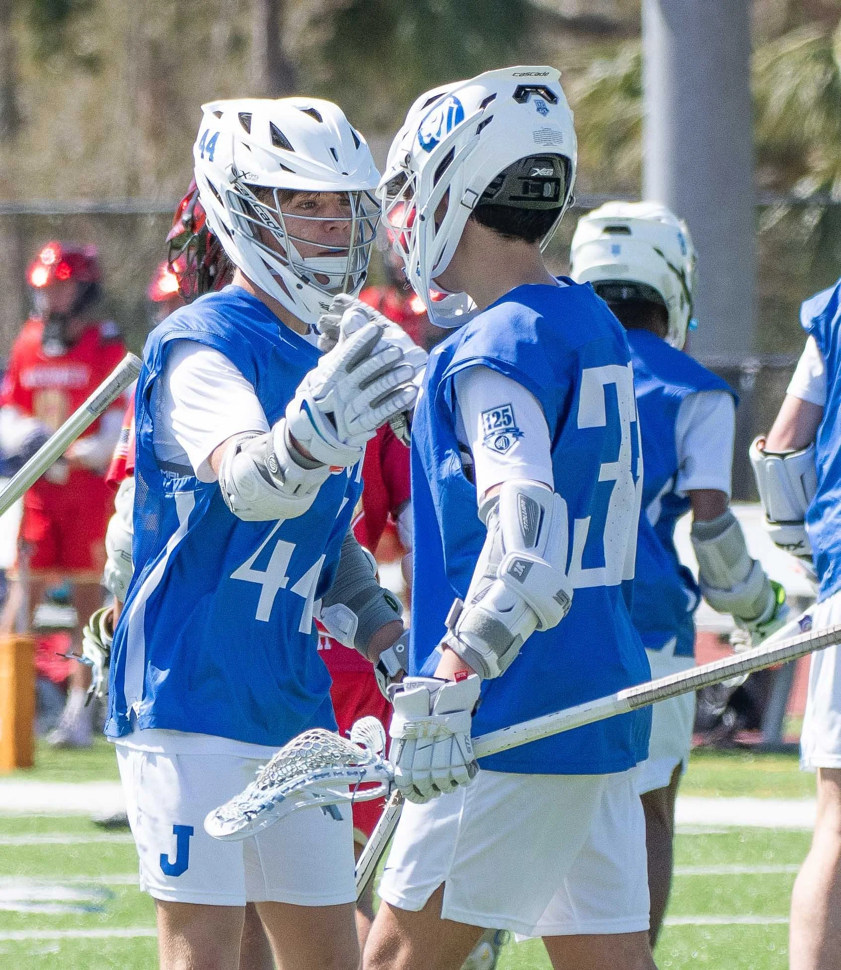 Lacrosse-Players-Shake-Hands.jpg