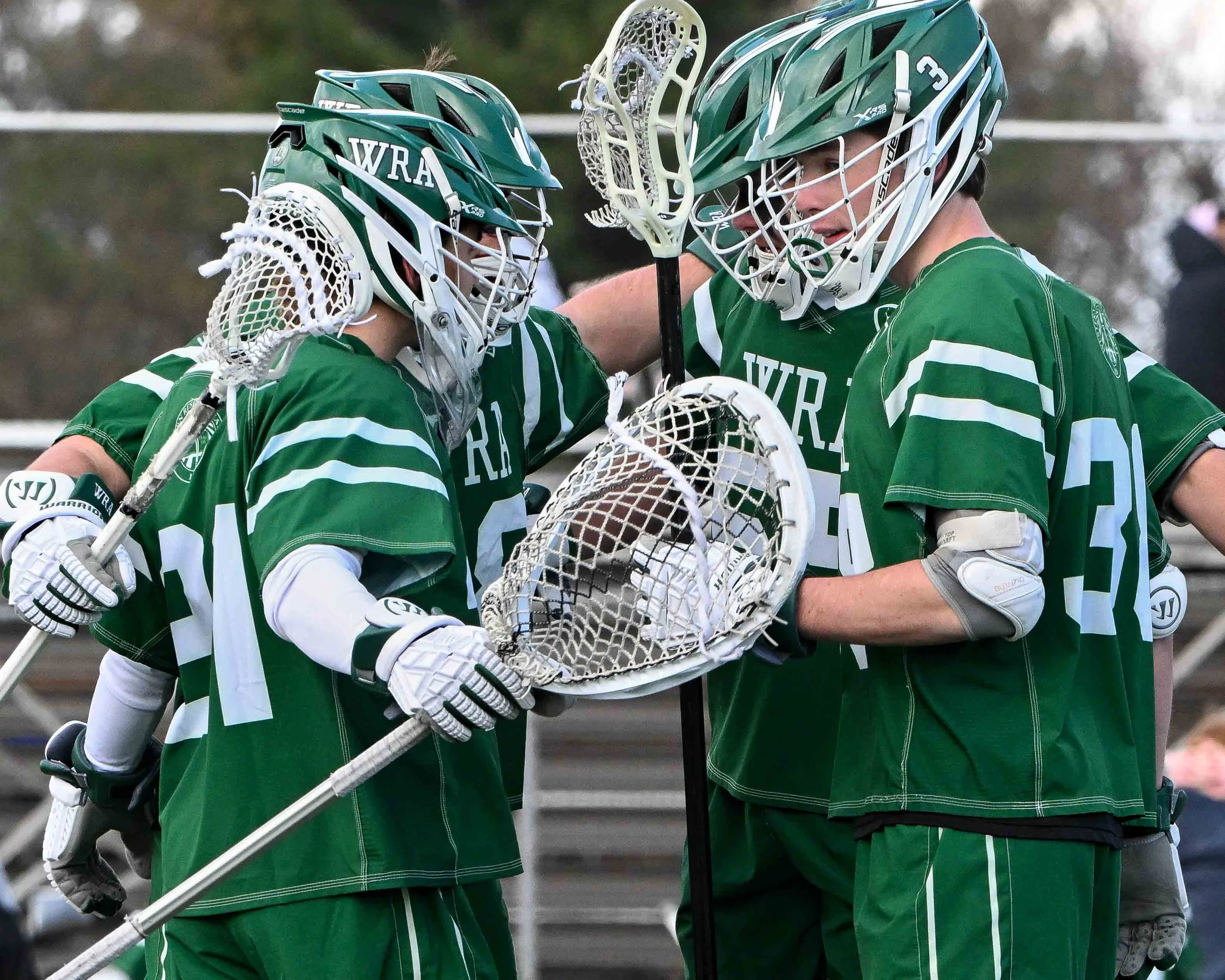 Lacrosse-Team-Huddle.jpg