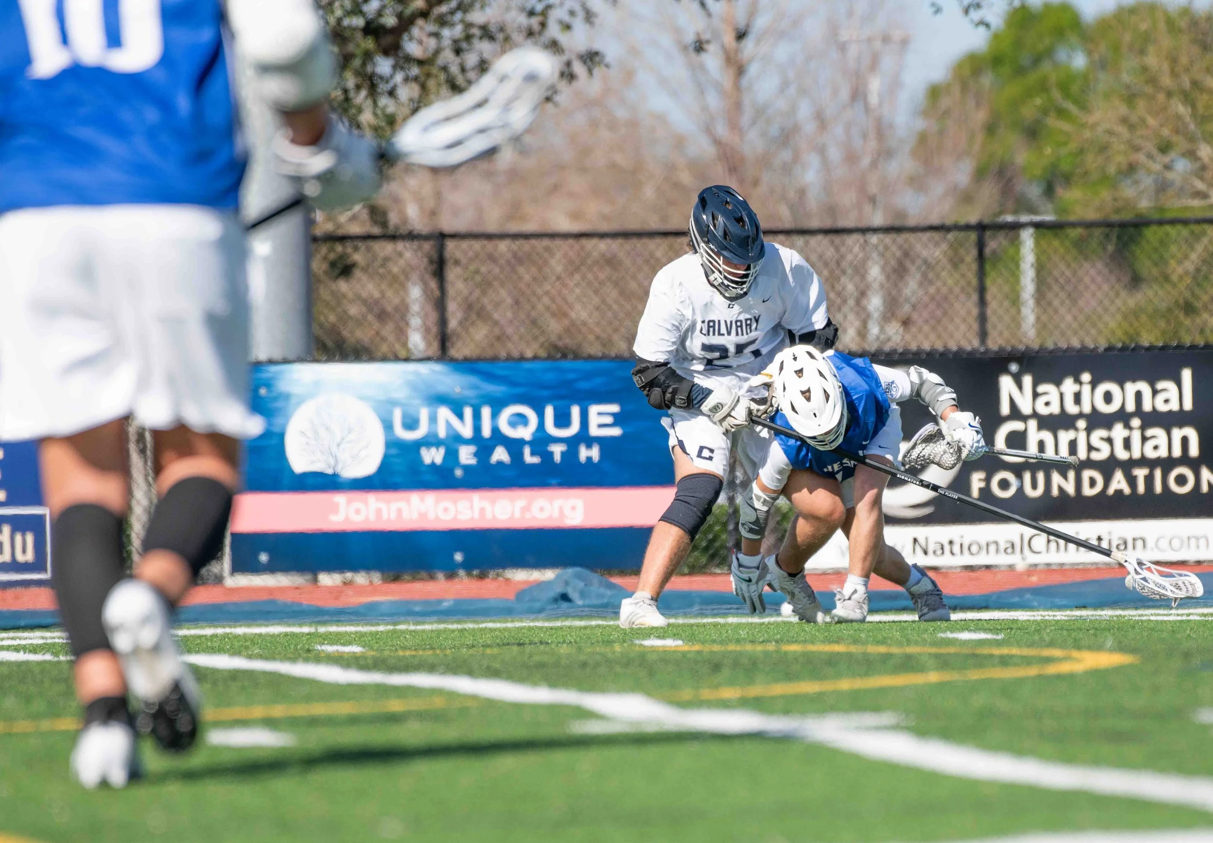 Jesuit vs Calvery Lacrosse Players.jpg