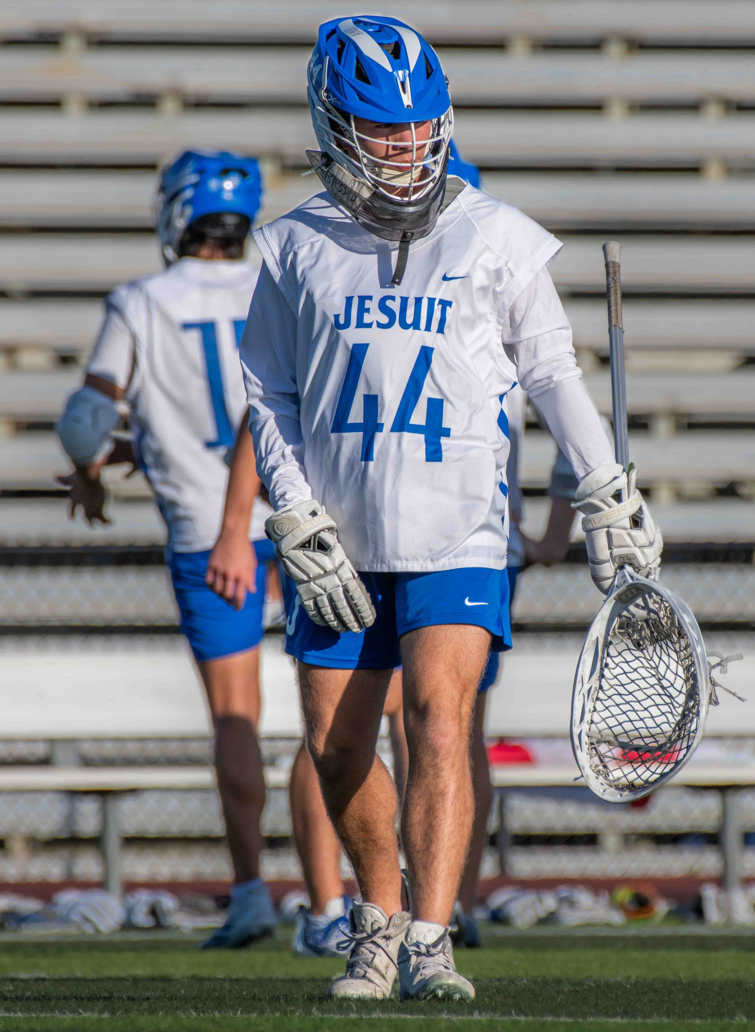 Lacrosse-Goalie-Walks-Onto-Feild.jpg