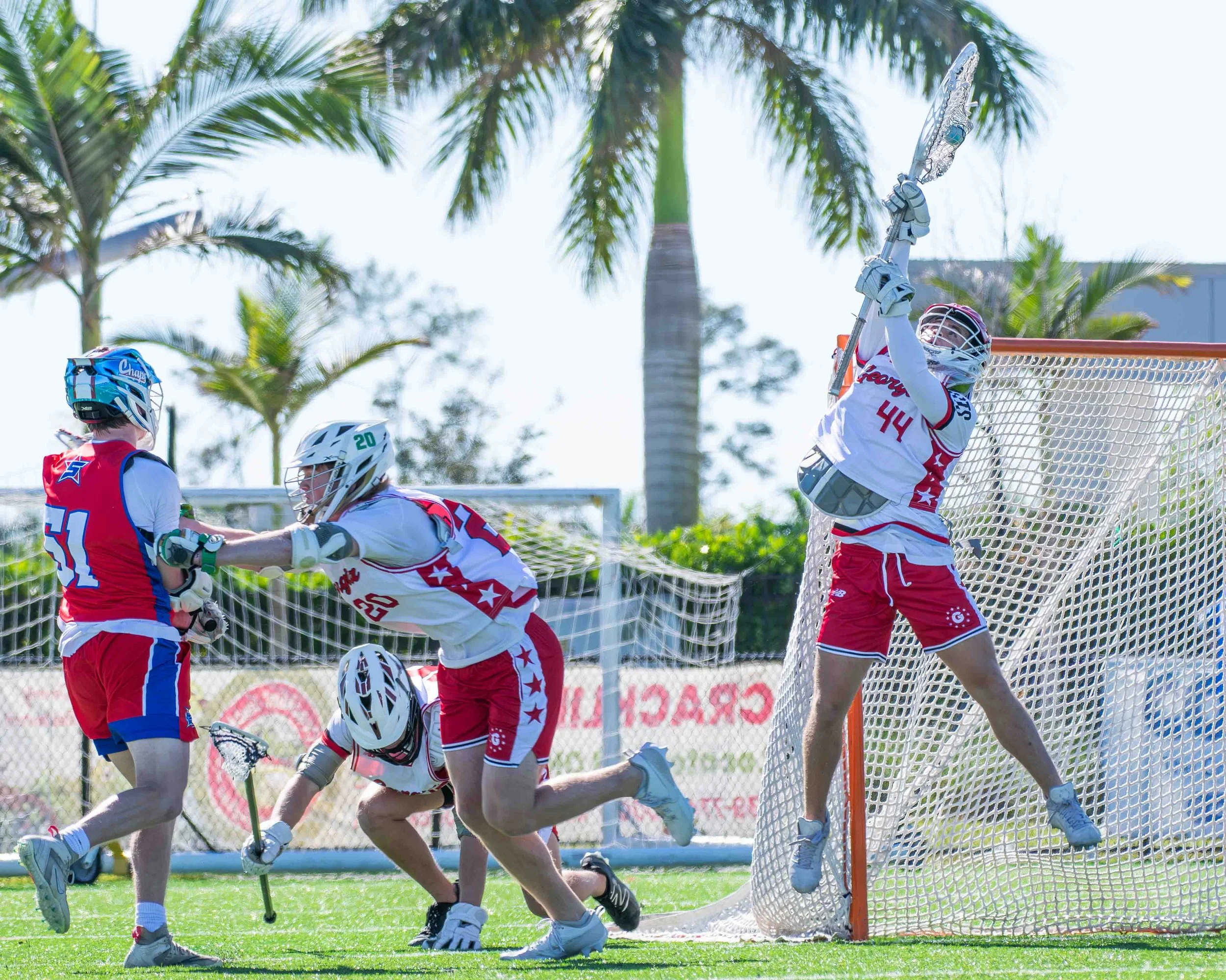 Lacrosse-Goalie-Makes-Arobatic Save.jpg