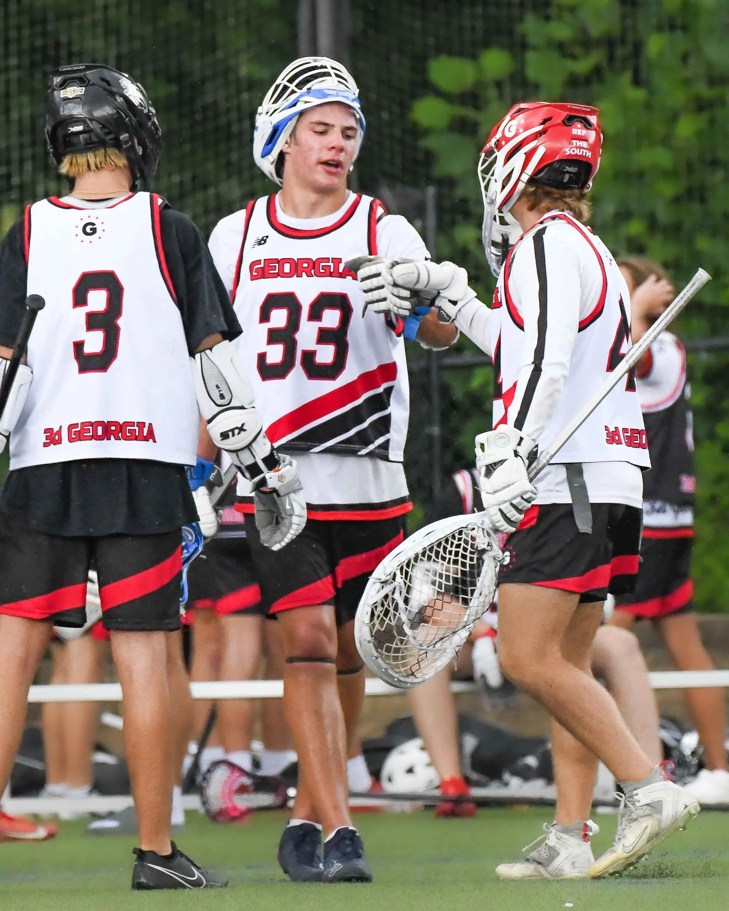 Lacrosse-Players-Fist-Bump.jpg