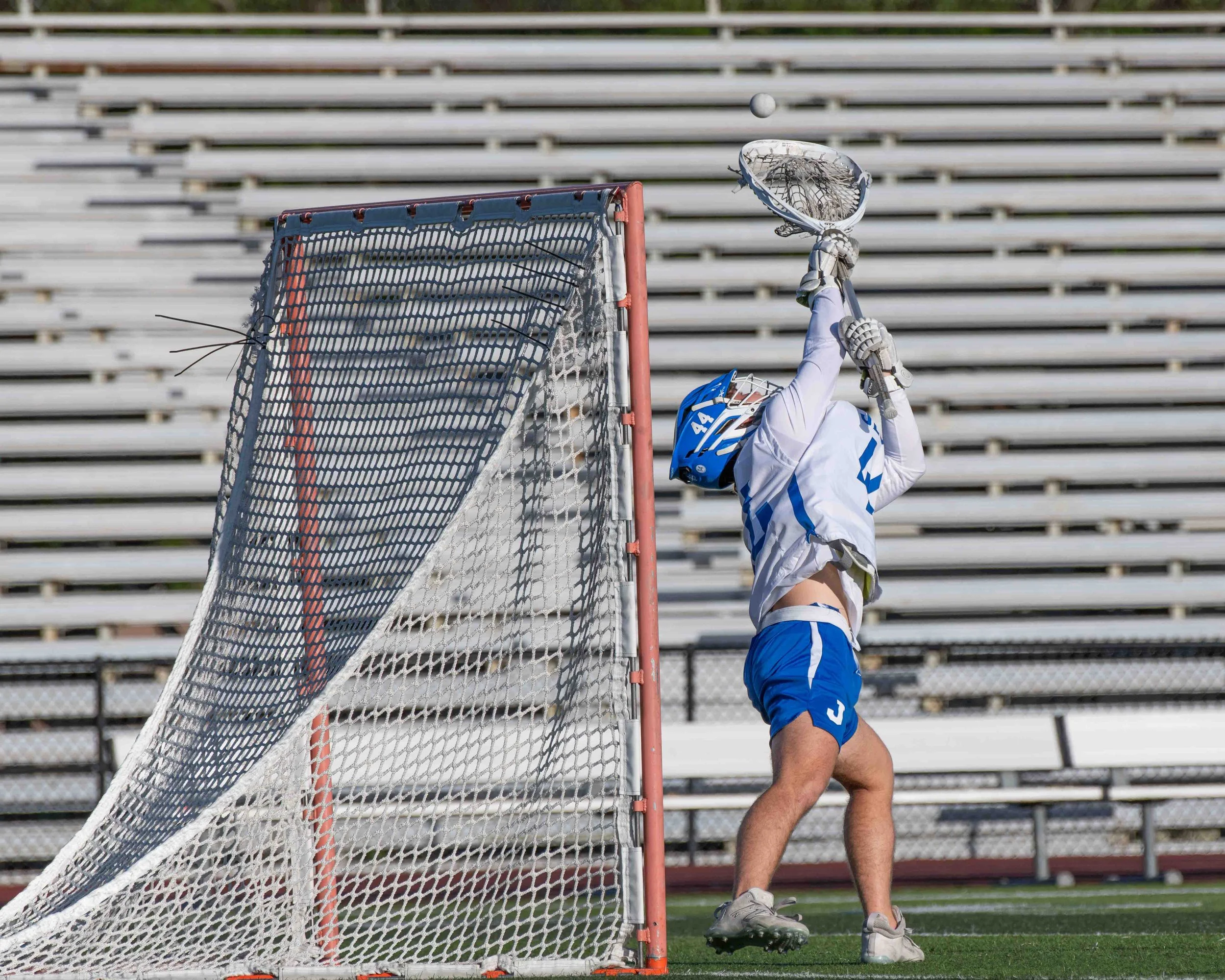 Run Out Jesuit Lacrosse Players L-3.jpg