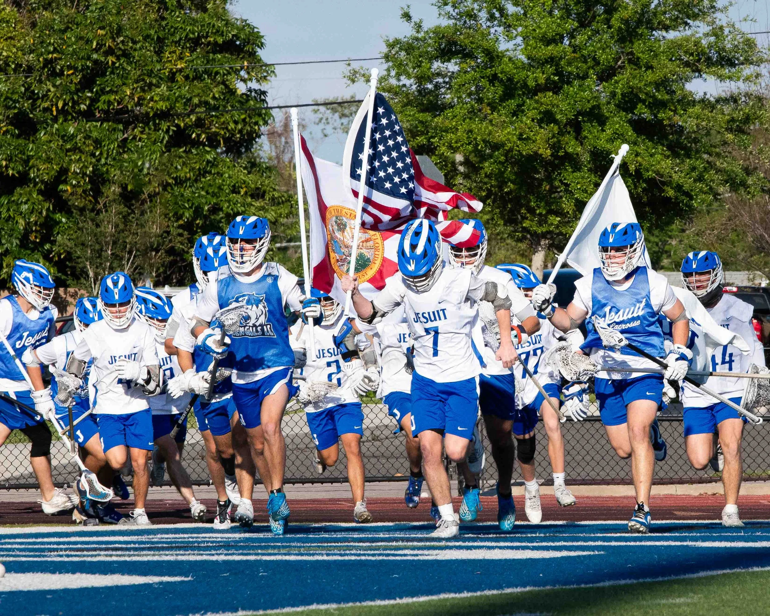 Lacrosse-Team-WIth American-Flag.jpg