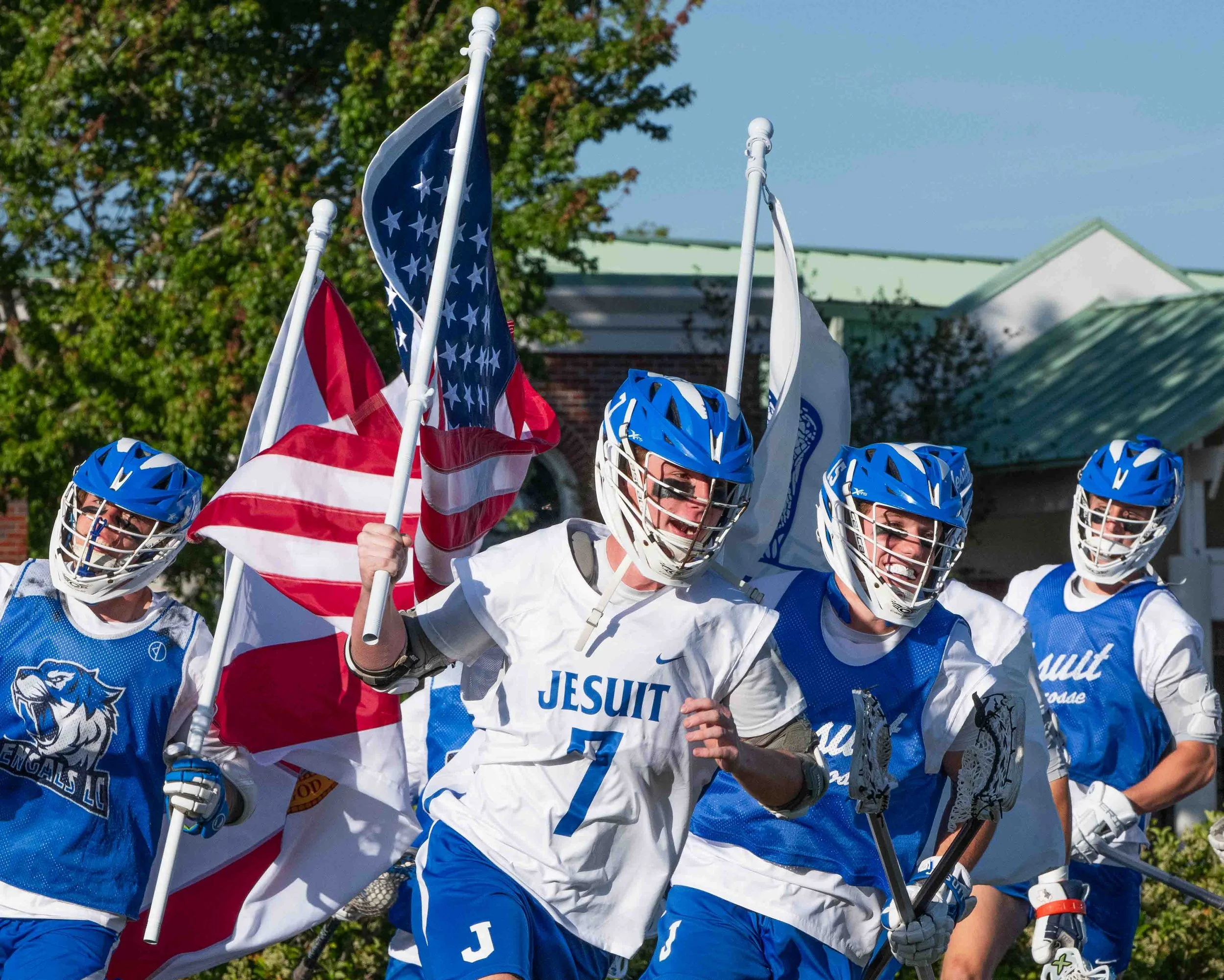 Run Out Jesuit Lacrosse Players L-2.jpg