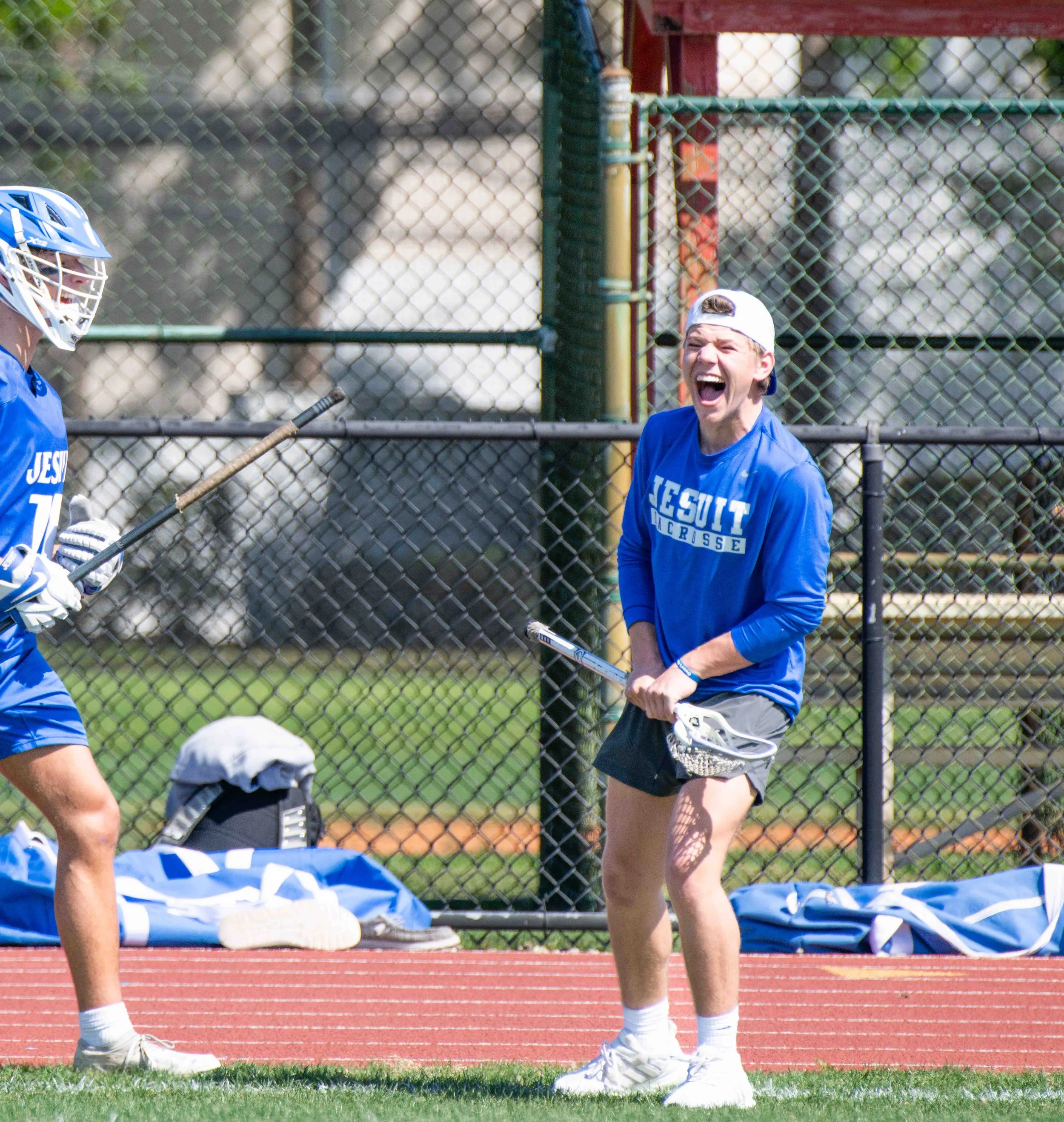 Lacrosse-Player-Sideline- Celbration.jpg