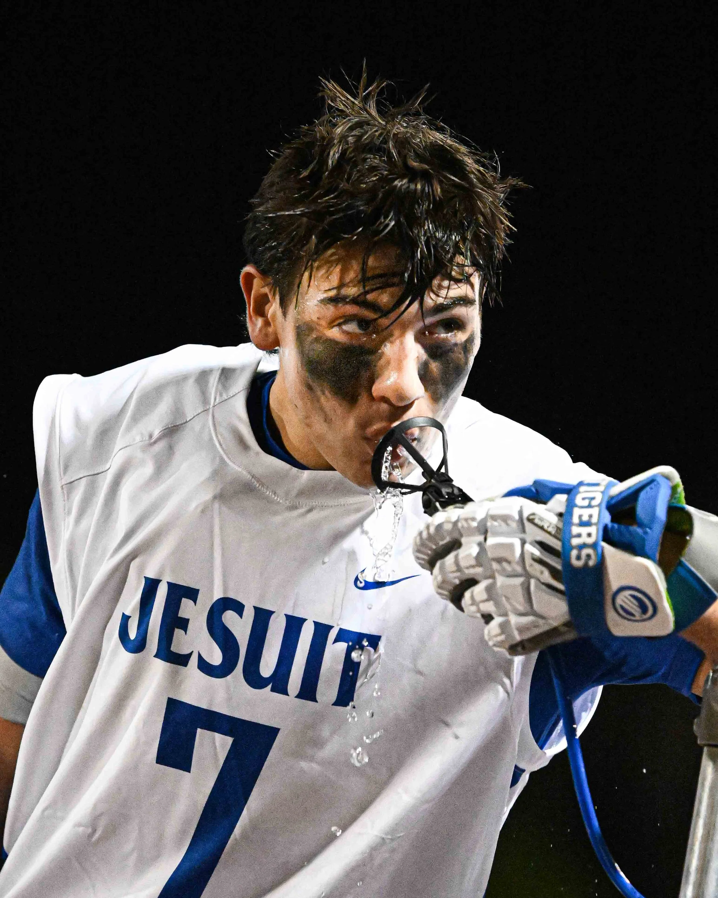 Lacrosse-Player-Gets-Water.jpg