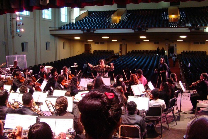 Conducting at a workshop with the Santa Ana High School Symphony Orchestra