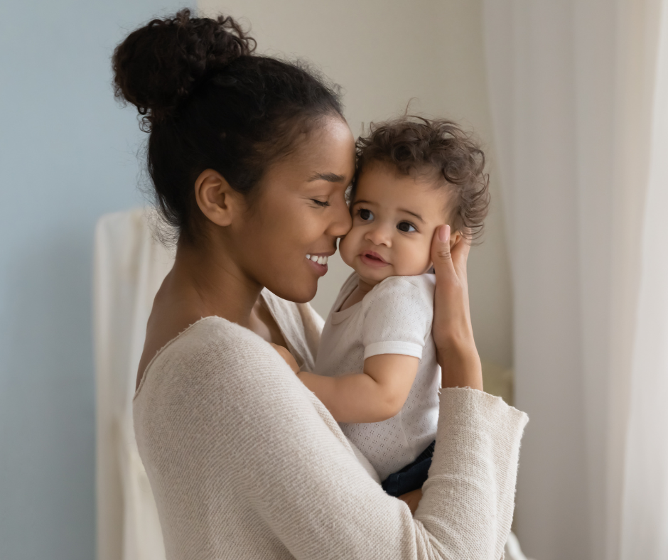 mother holding baby representing postpartum changes in motherhood and marriage