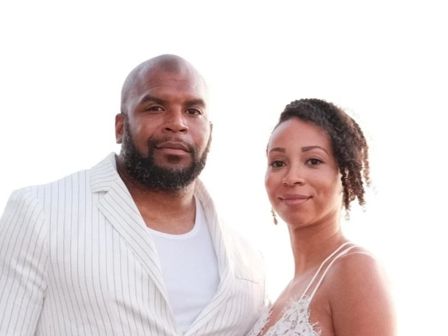 smiling couple standing close together outdoors, representing connection and emotional intimacy