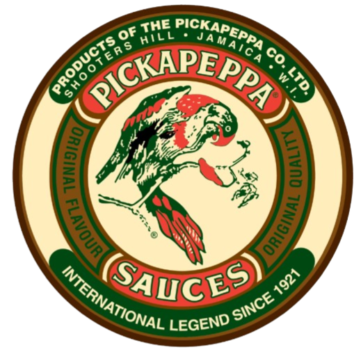 Round logo for Pickapeppa Sauces featuring an eagle with a red tongue and wings, and a green head, surrounded by green and beige text about the product's origin and quality.