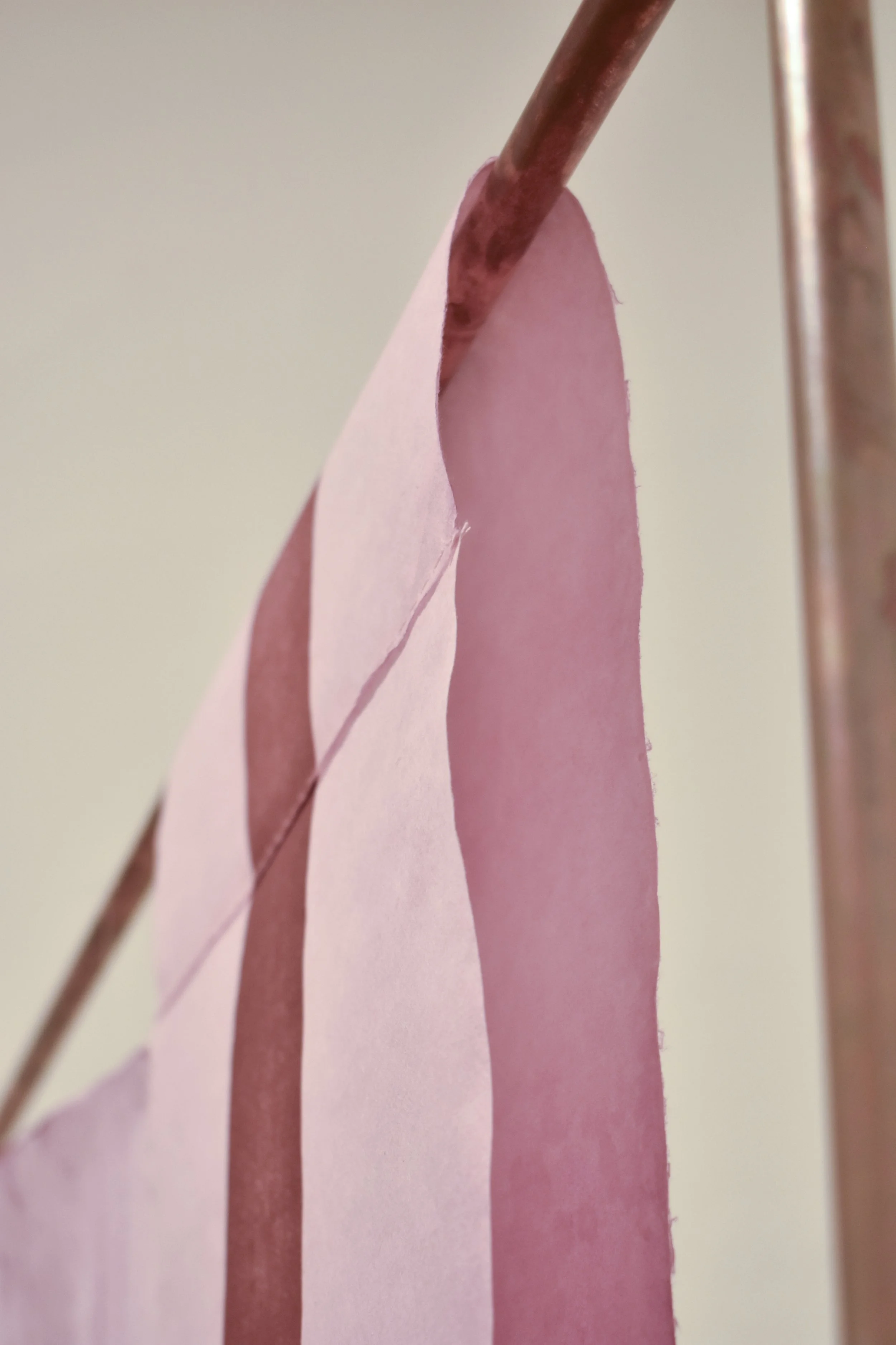 Path Carried by Time, 2025. Mulberry paper dyed with cochineal and indigo, monotype, hand stitching, tengucho paper repairs, copper structure  ·  Main frame 4 ft × 6 ft; copper assembly extends to 11 ft