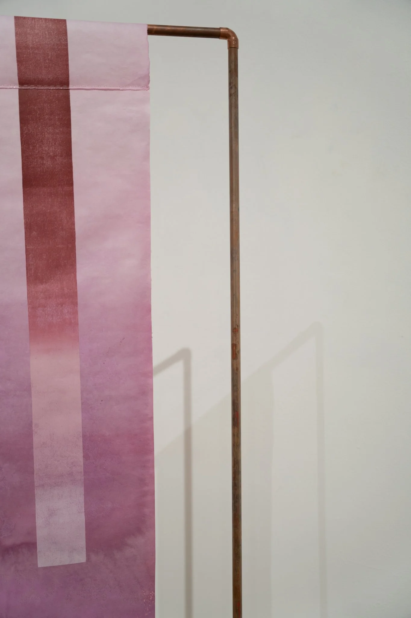 Path Carried by Time, 2025. Mulberry paper dyed with cochineal and indigo, monotype, hand stitching, tengucho paper repairs, copper structure · Main frame 4 ft × 6 ft; copper assembly extends to 11 ft
