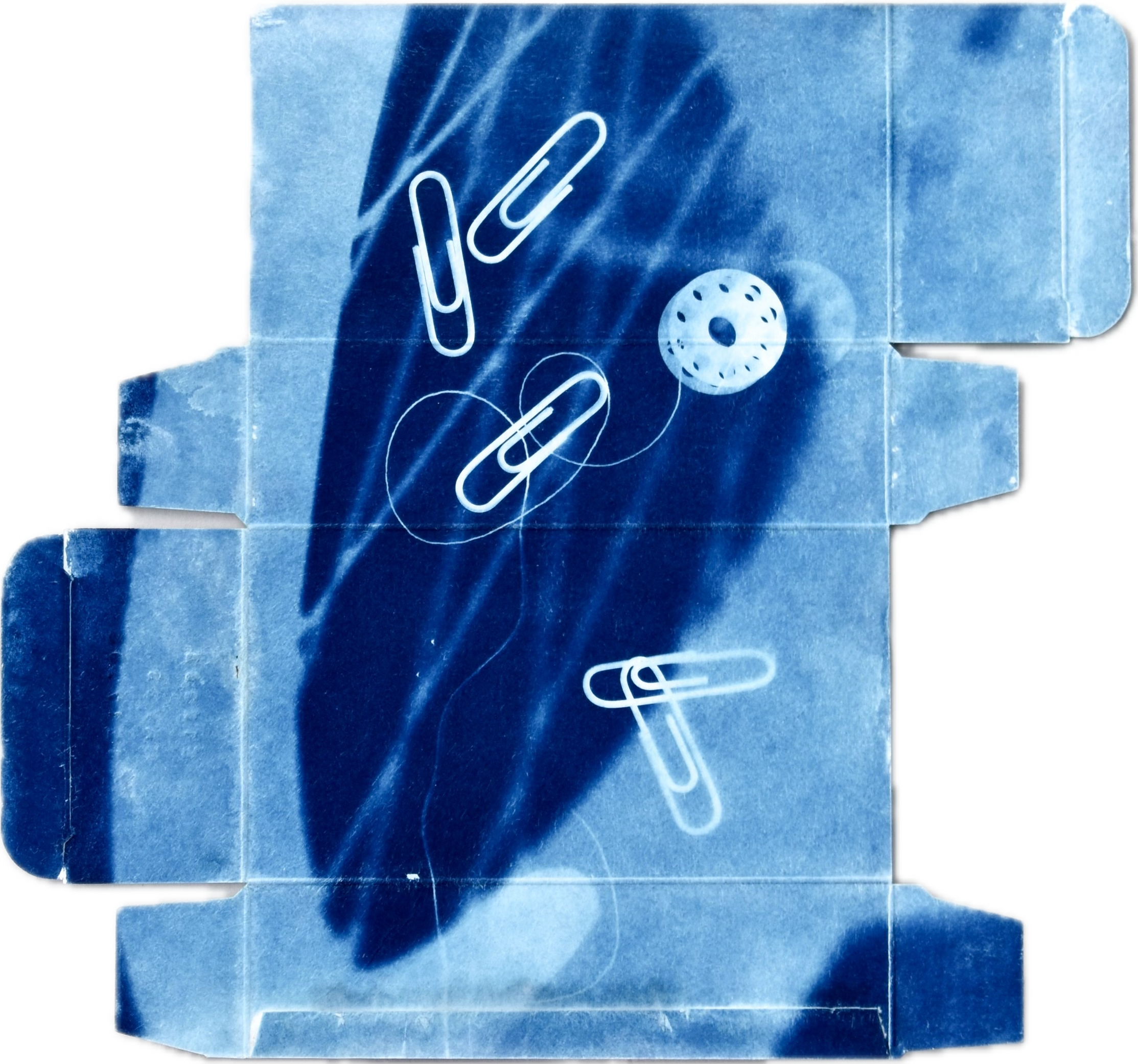 Sewing box, 2023. Cyanotype on medicine carton box, 18 x 20 cm