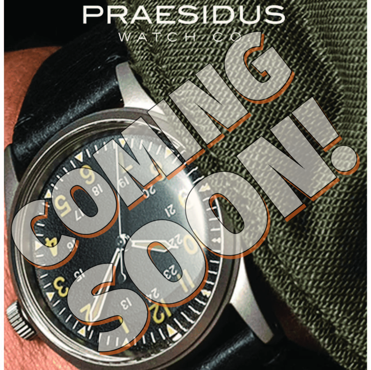 A wristwatch with a black strap and a round face showing white and yellow markings; overlaid with large, semi-transparent text reading 'COMING SOON!'