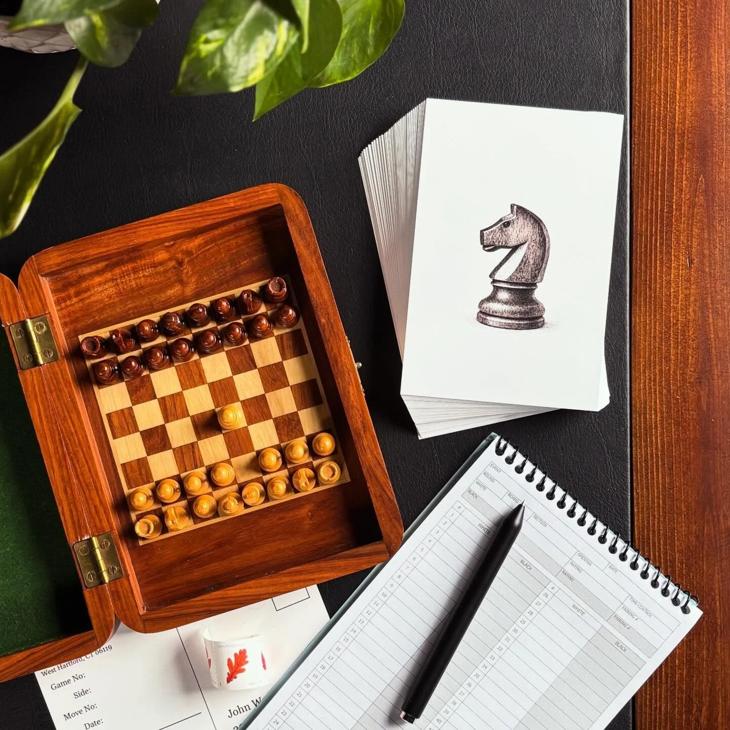 A move written.
A stamp affixed.
A card sent by post.

Correspondence chess was played this way; real boards, cards exchanged by mail, handwritten moves, ritualized play, time to think.

Analog chess for modern life. 

Beautiful tools for effortless 