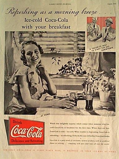 Vintage newspaper page with an ad for Coca-Cola featuring a smiling woman sitting at a table with breakfast items, and an inset photo of two men in hats with a caption about starting the day with Coca-Cola.