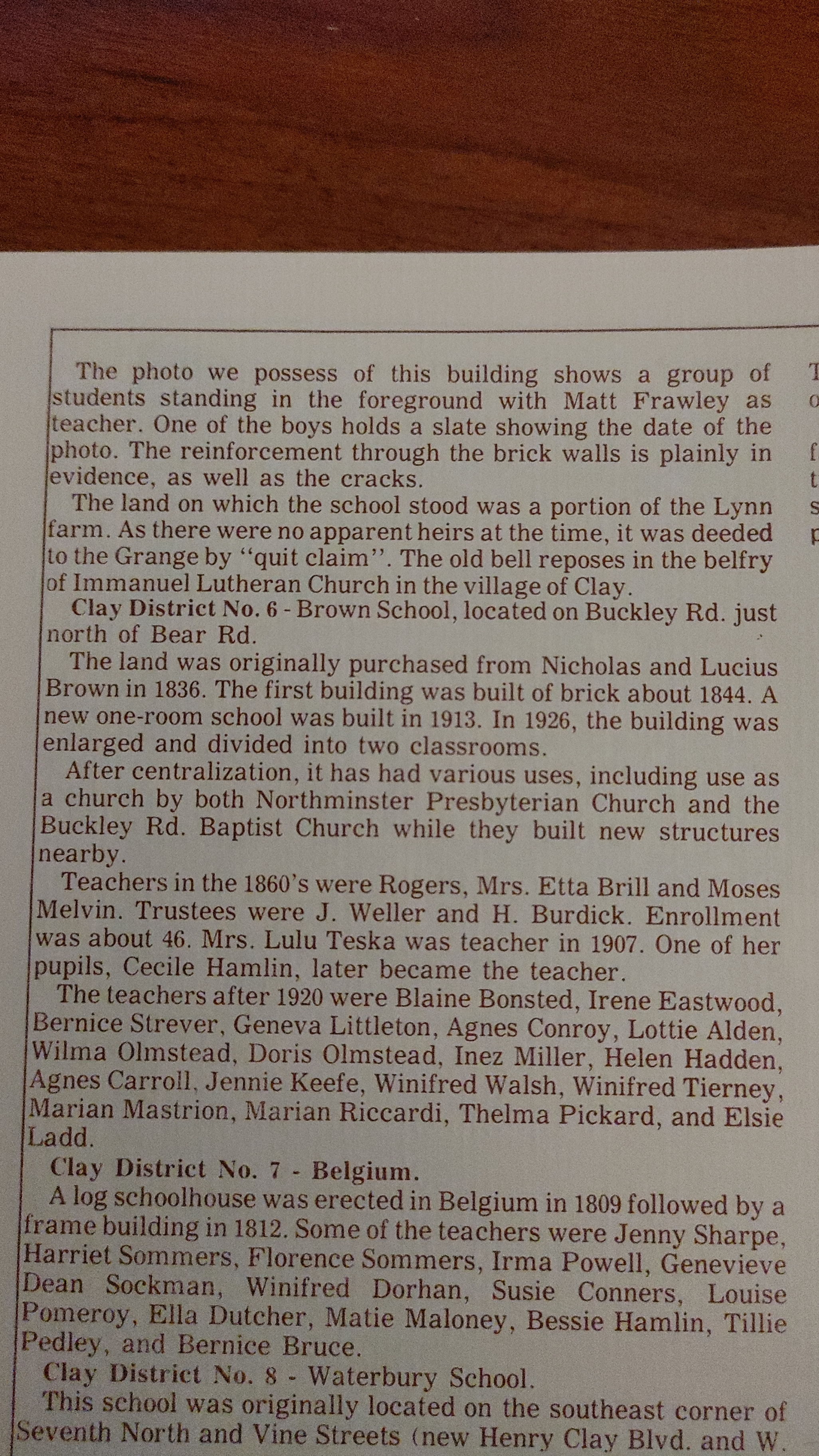 Historical text describing the history of Clay District No. 6 - Brown School, and surrounding schools and teachers, located on Buckley Rd., with details about its construction, usage, and notable teachers over the years.