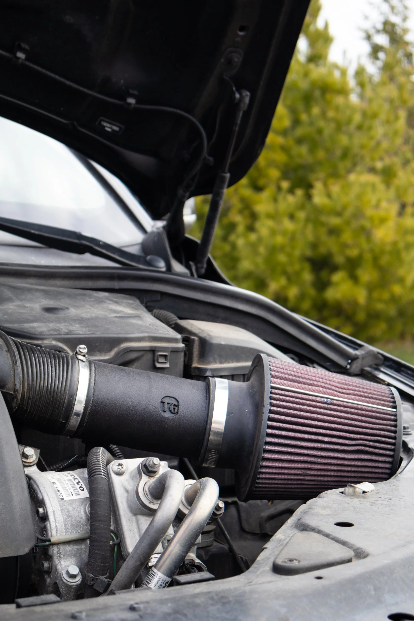 Volvo T6 engine bay, hood up, with the SilvaDes cold air intake installed