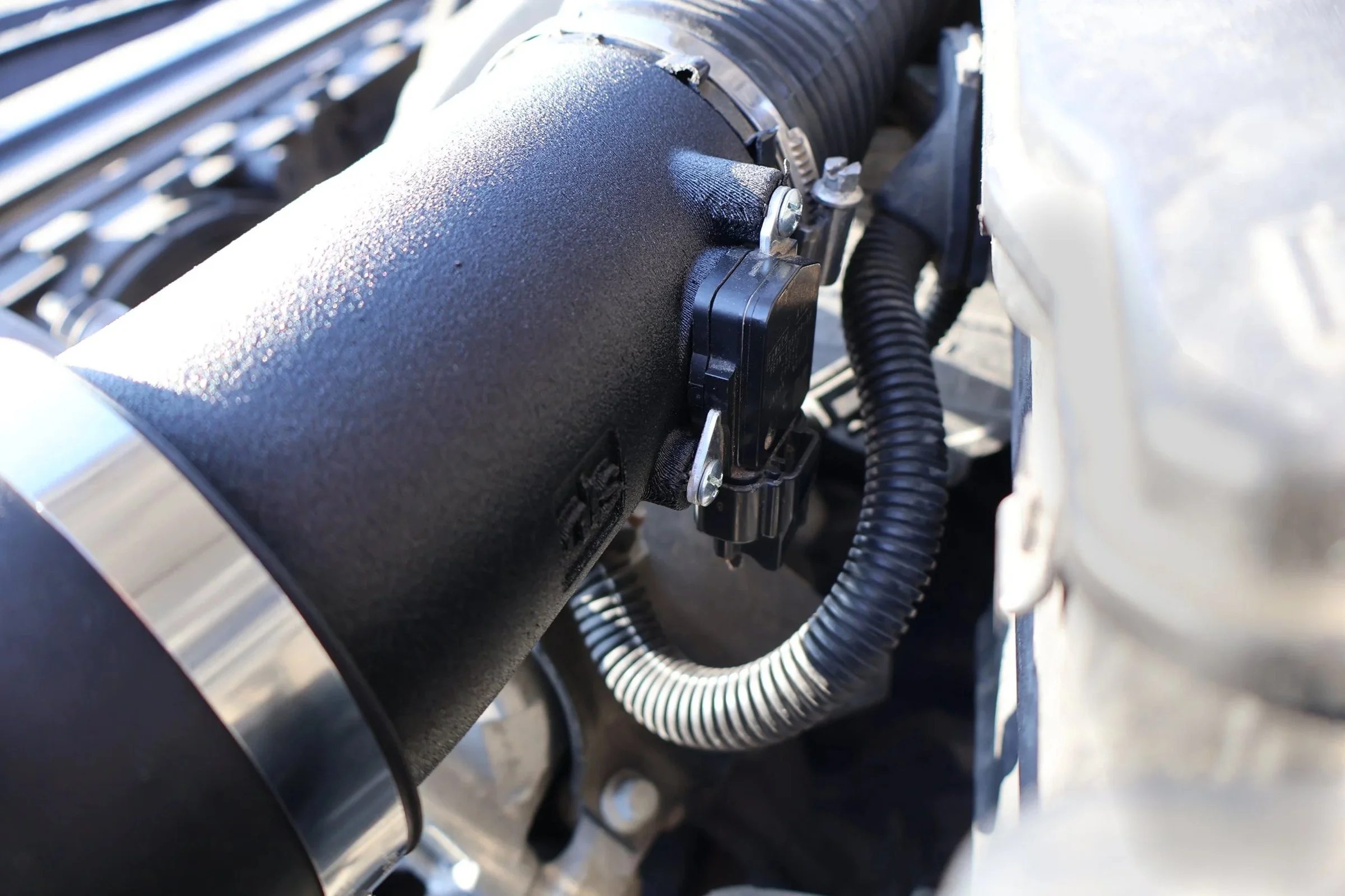 Stock Volvo MAF sensor plugged into the SilvaDes printed intake (v4), harness connected