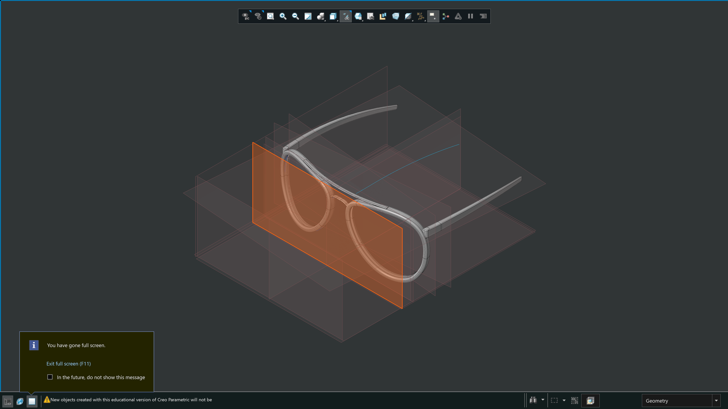 A 3D CAD model of eyeglasses displayed in a CAD software interface with various toolbars. The glasses have a round frame design shown in a semi-transparent view with highlighted parts.