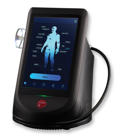 Medical device with touchscreen displaying a human body diagram for selecting body parts like head, neck, shoulder, thoracic, elbow, lumbar, sacrum, hip, knee, ankle, foot, wrist, and cervical.